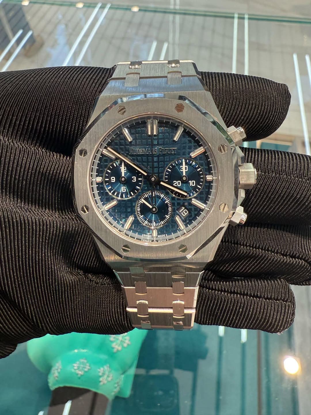 May be an image of wrist watch and text