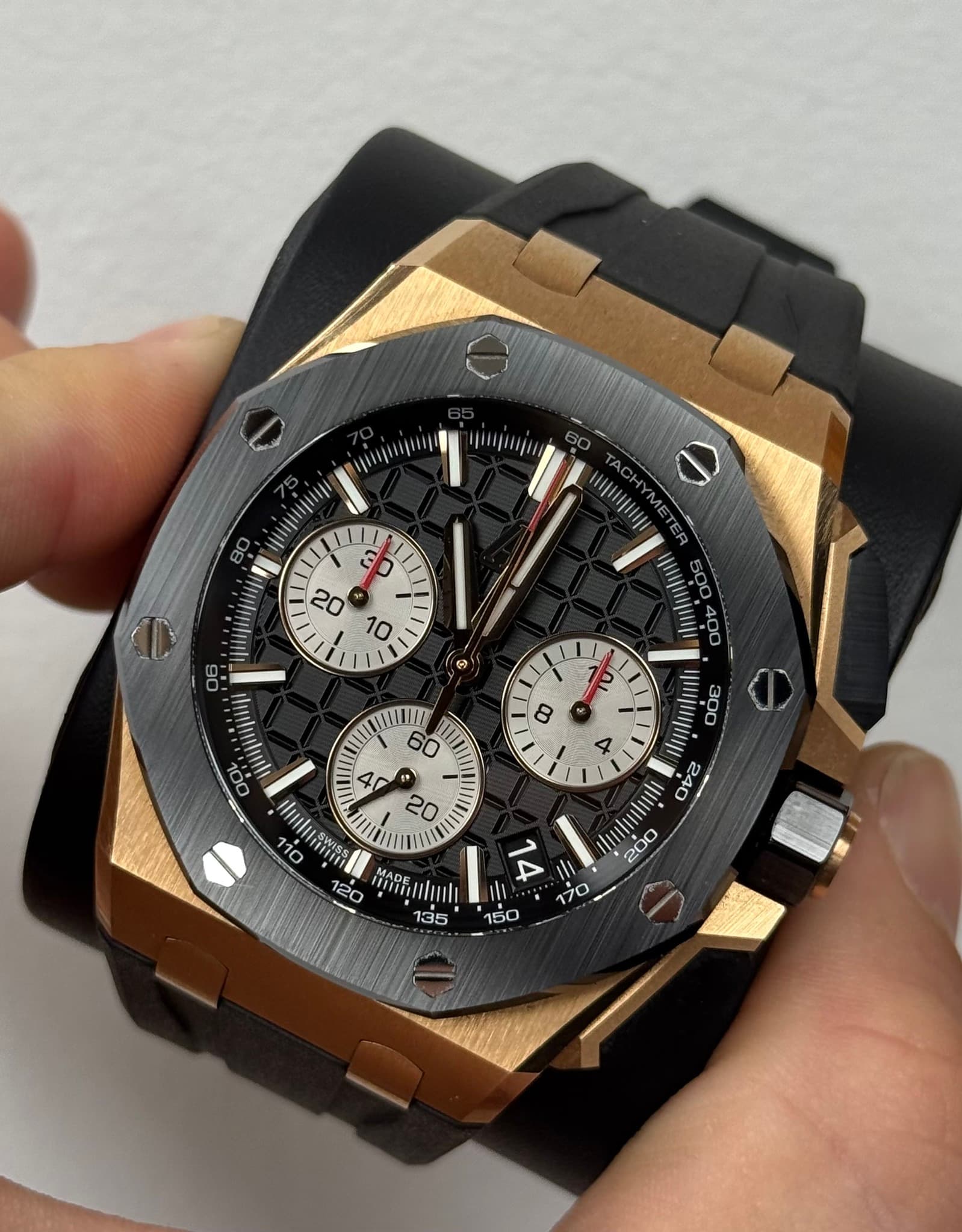 May be an image of wrist watch and text