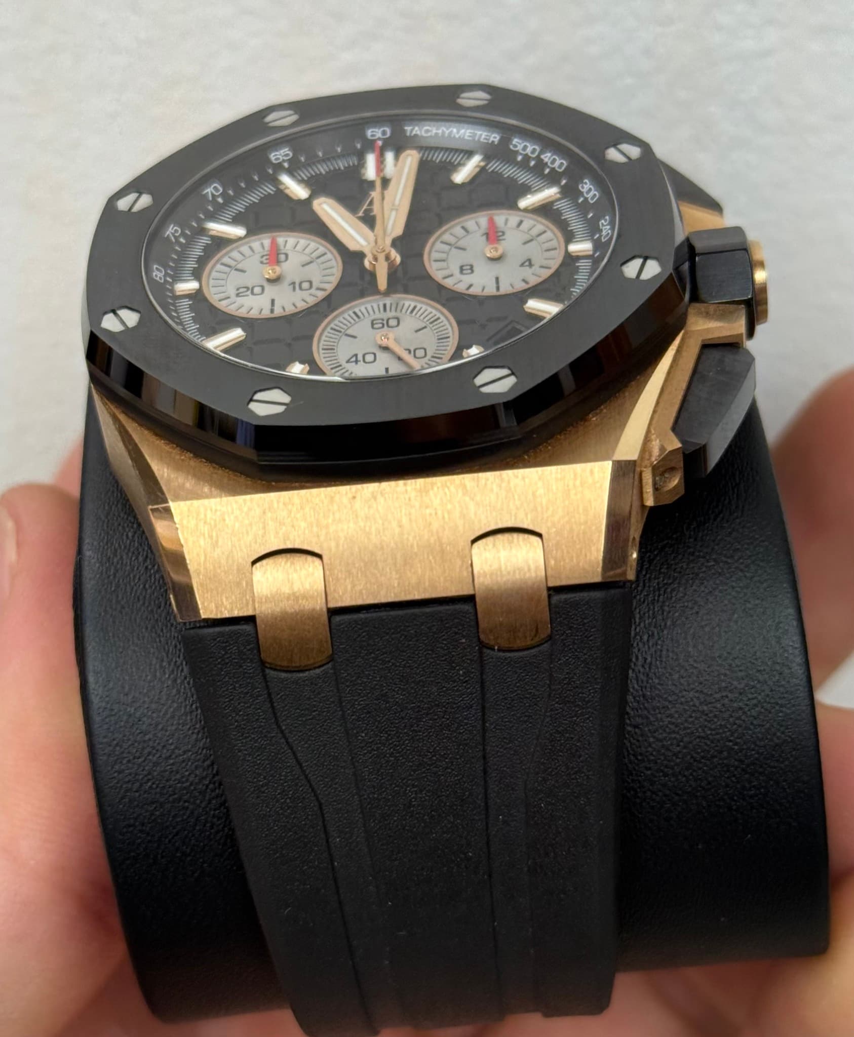 May be an image of wrist watch and text