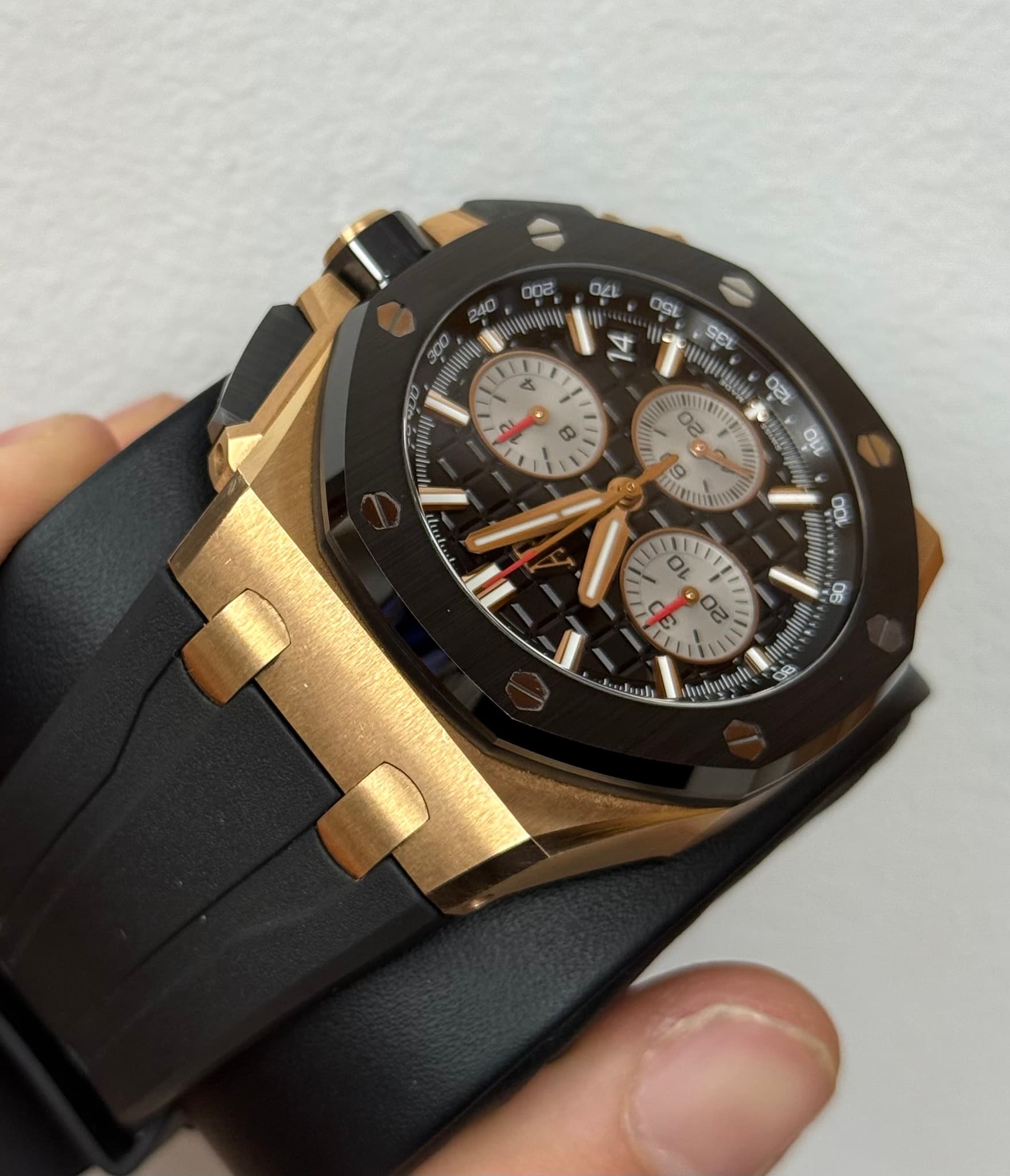 May be an image of wrist watch and text