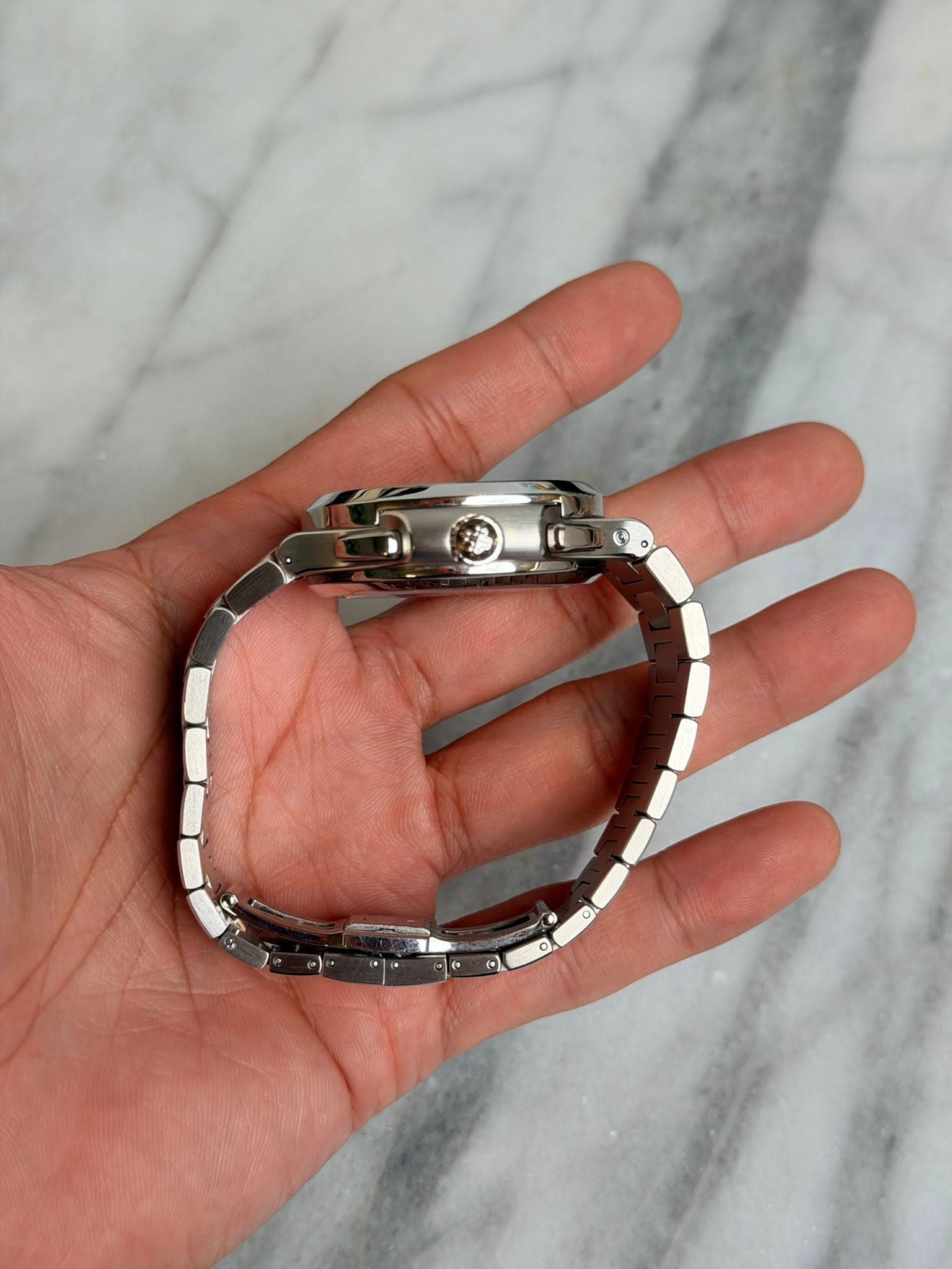 May be an image of jewelry and wrist watch