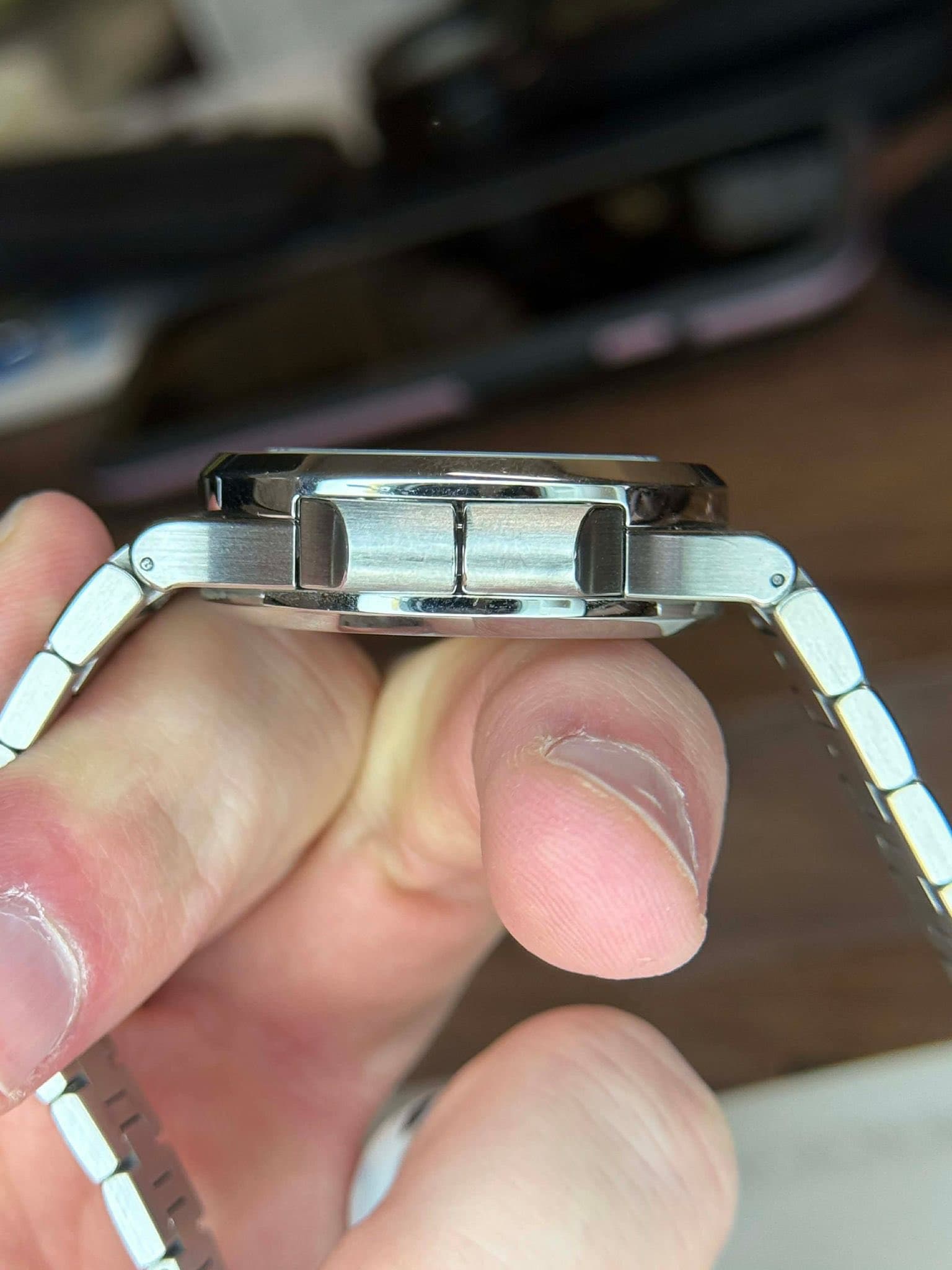 May be an image of wrist watch