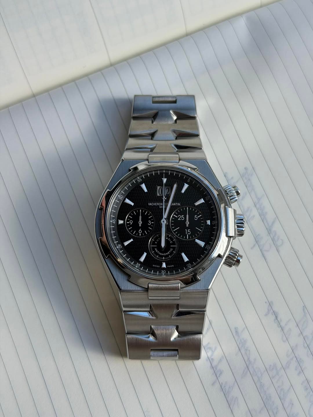 May be an image of wrist watch and text