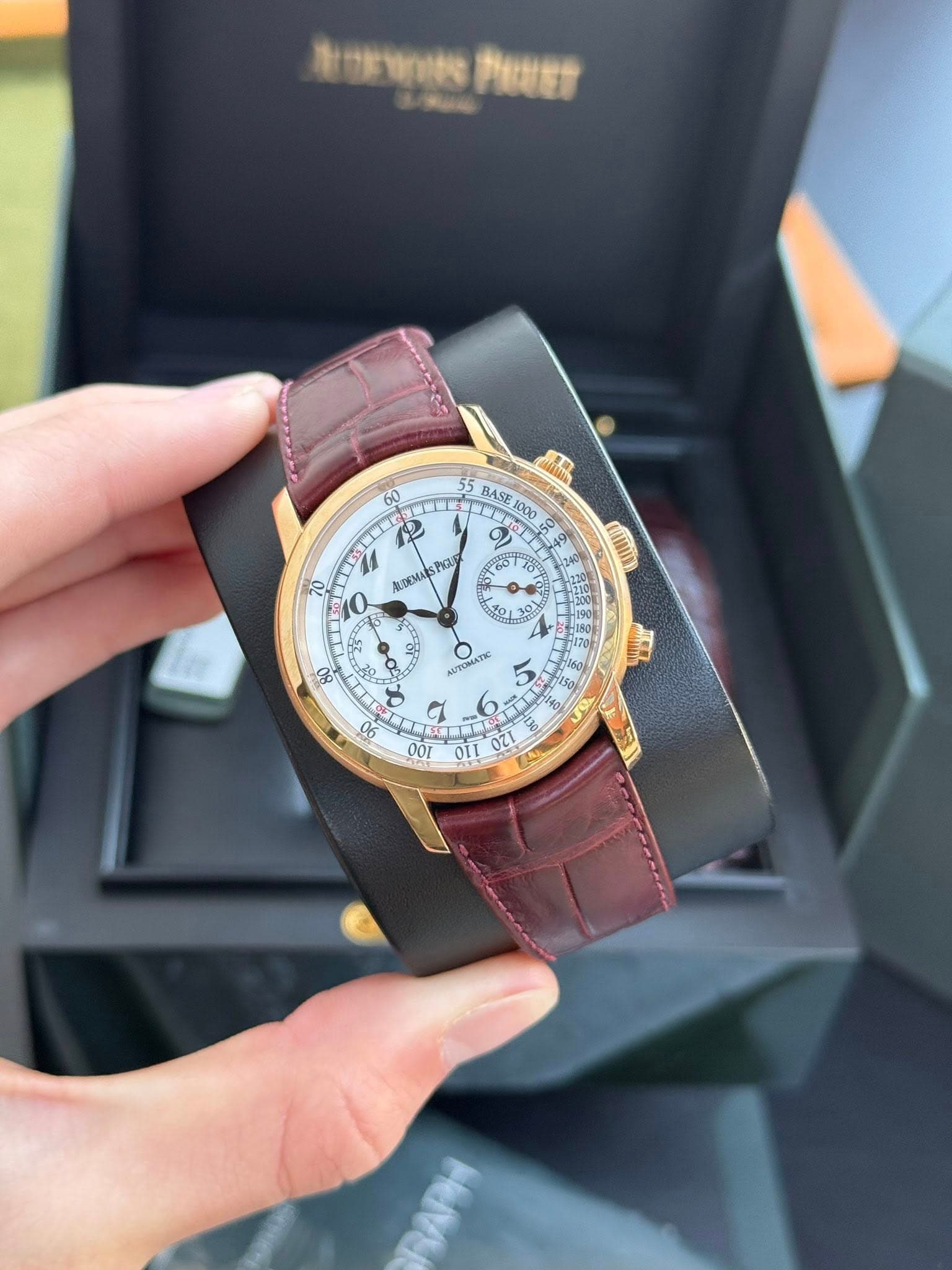 May be an image of wrist watch and text