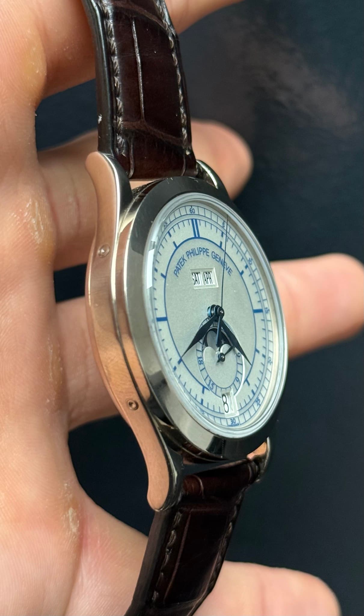 May be an image of wrist watch and text that says 'PHILIPPE GE GENIVE PATEK TM SAMPA VA 81'
