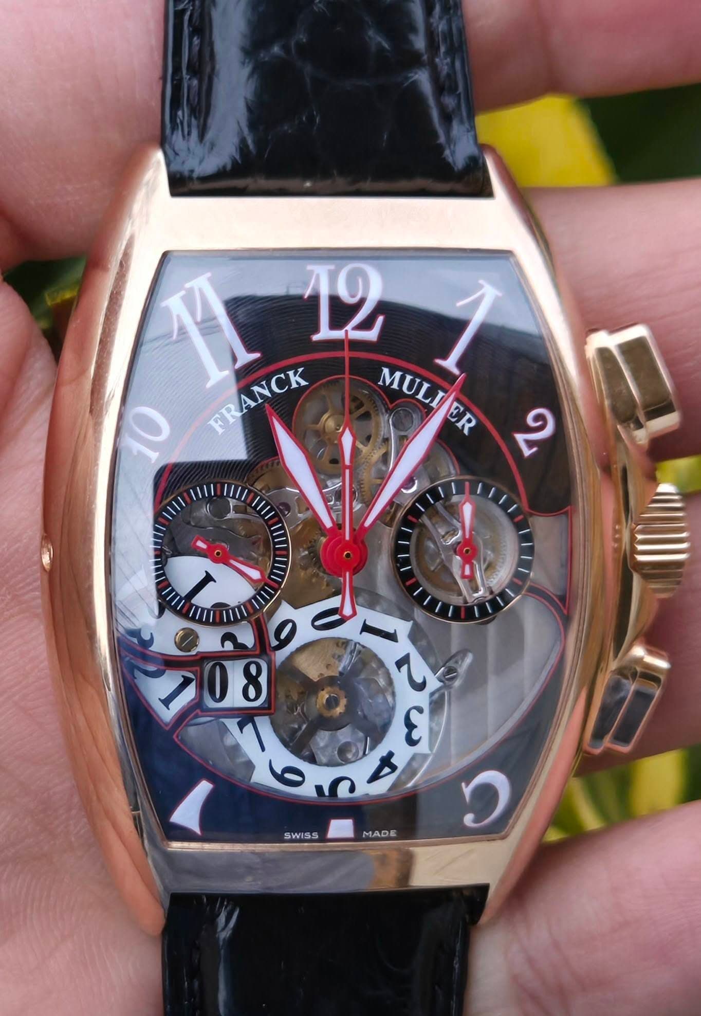 May be an image of wrist watch and text that says 'TI 12 10 FRANCK FRANCK MULTJER MULIER ១ 1|/ 1I1/ 1I// 1I/ 1II I หบ II 1 川 日 9 08 8 عحممه ε SWISS MADE ن'