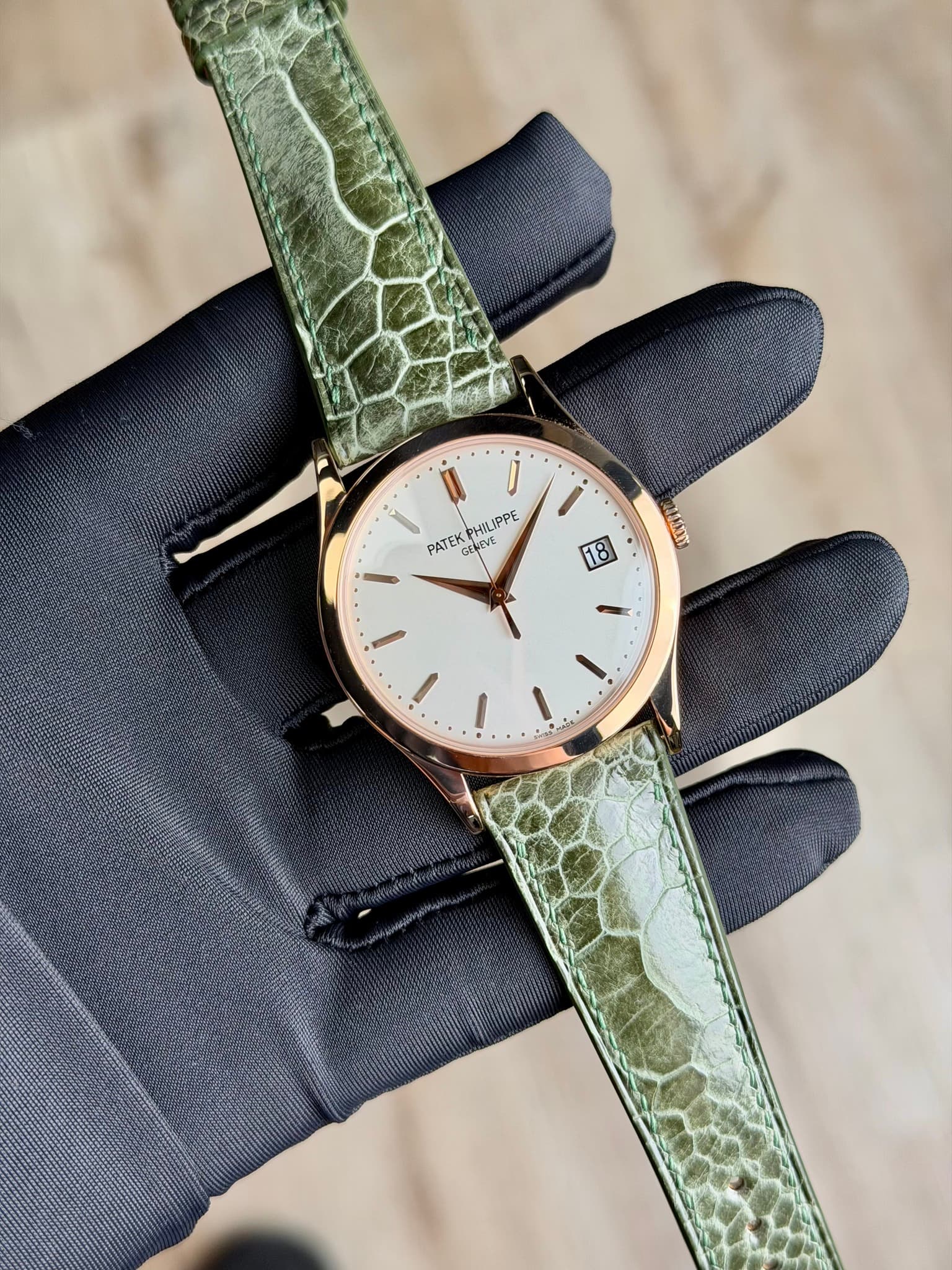 May be an image of wrist watch, leather and text that says 'HILIPPE PATEK GELINE + XX'