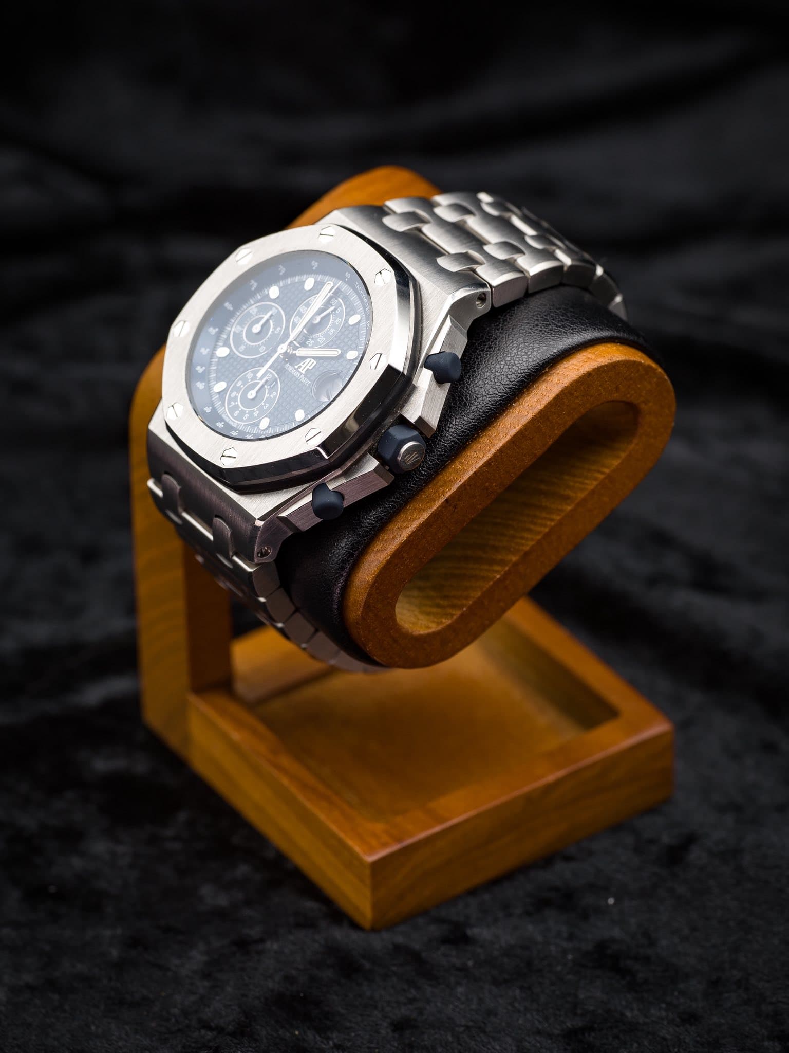 May be an image of wrist watch and text