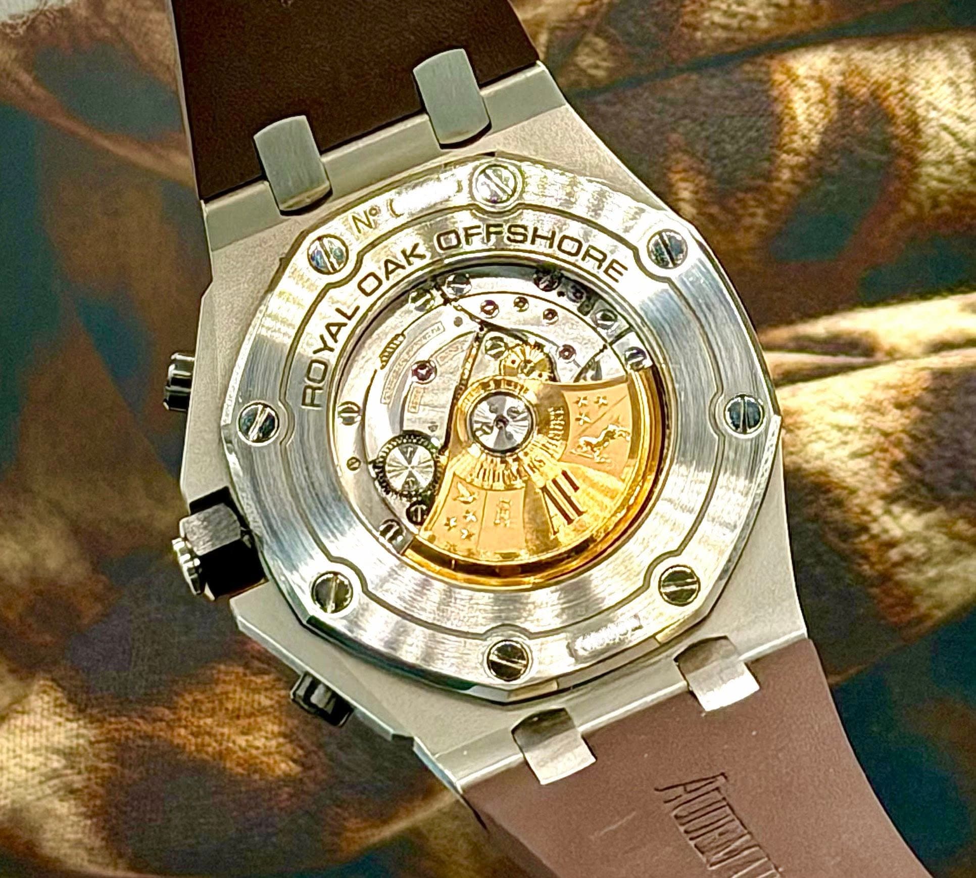 May be an image of wrist watch and text