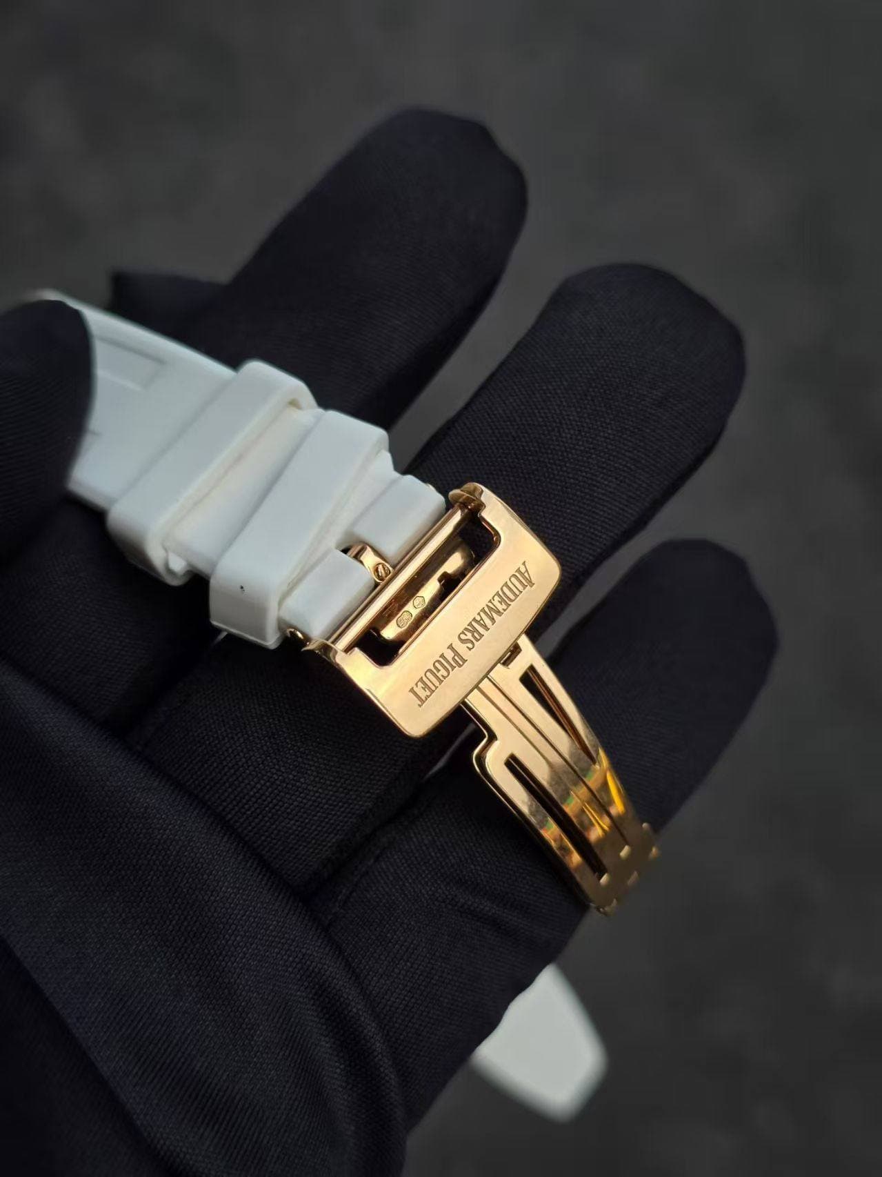 May be an image of wrist watch, cufflinks, ring and text