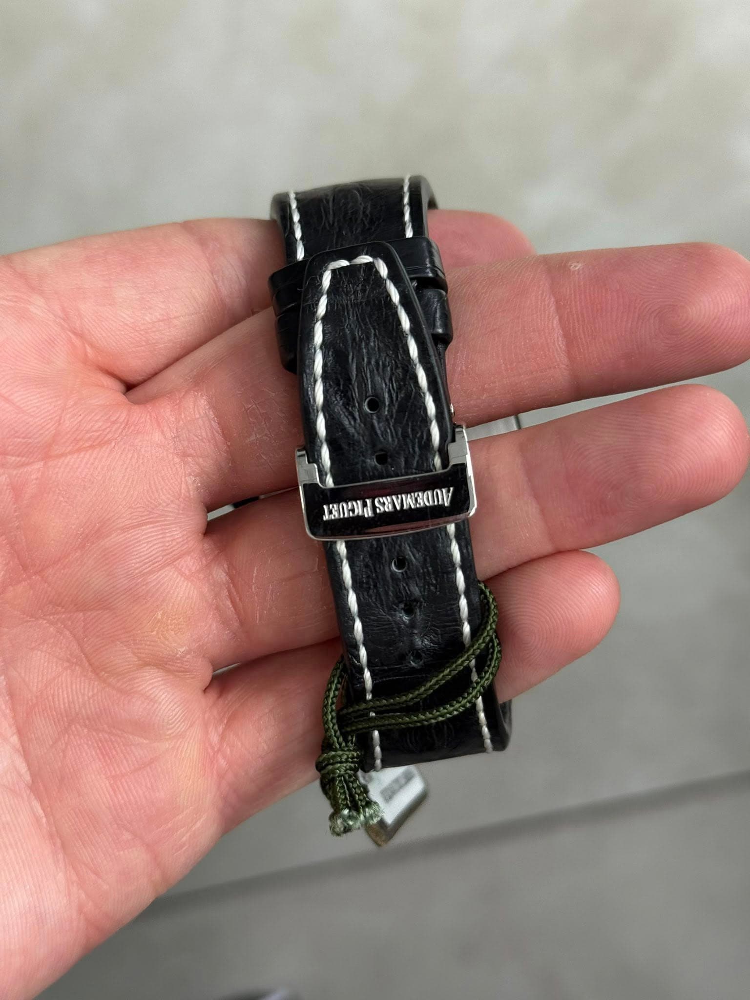 May be an image of digital watch and text