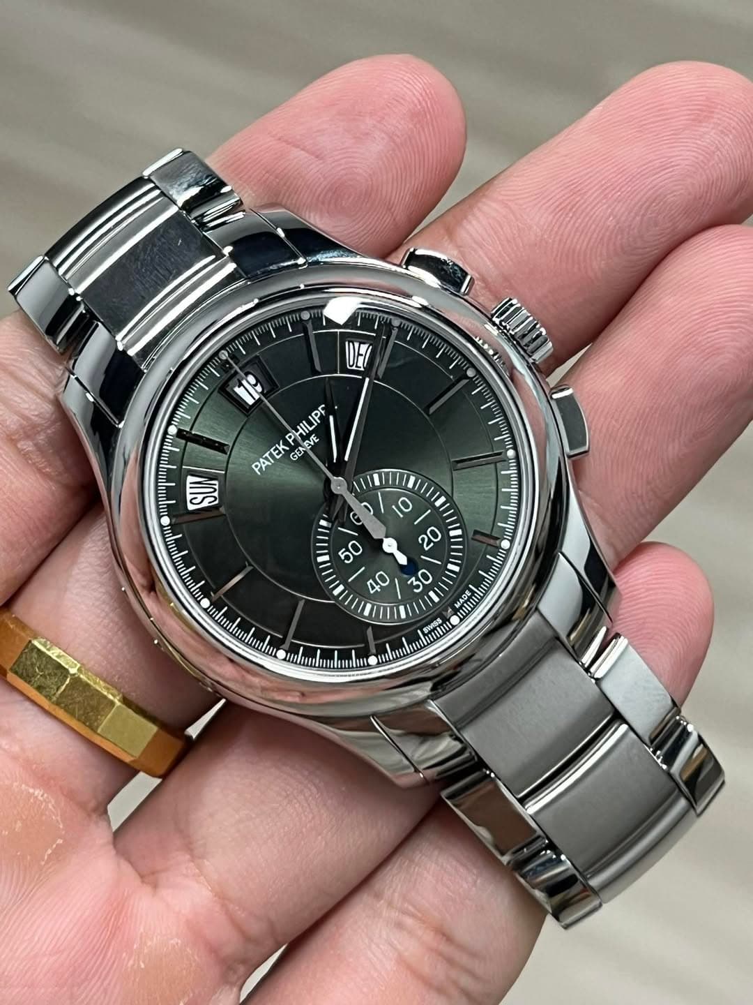 May be an image of wrist watch and text