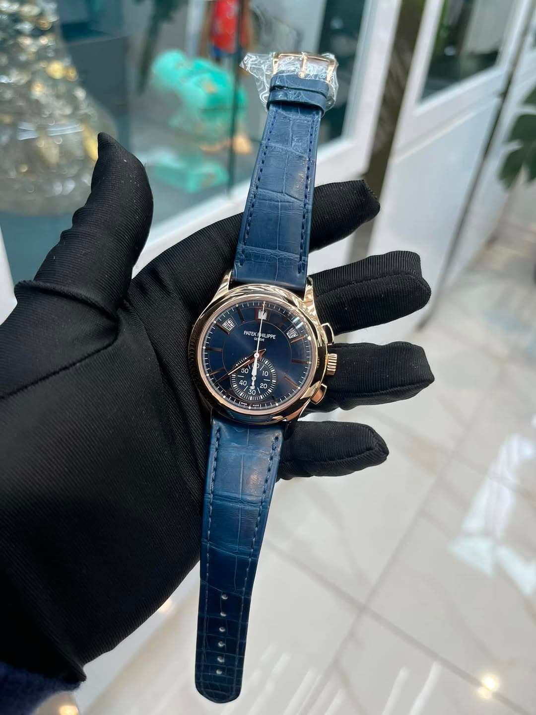 May be an image of wrist watch and text