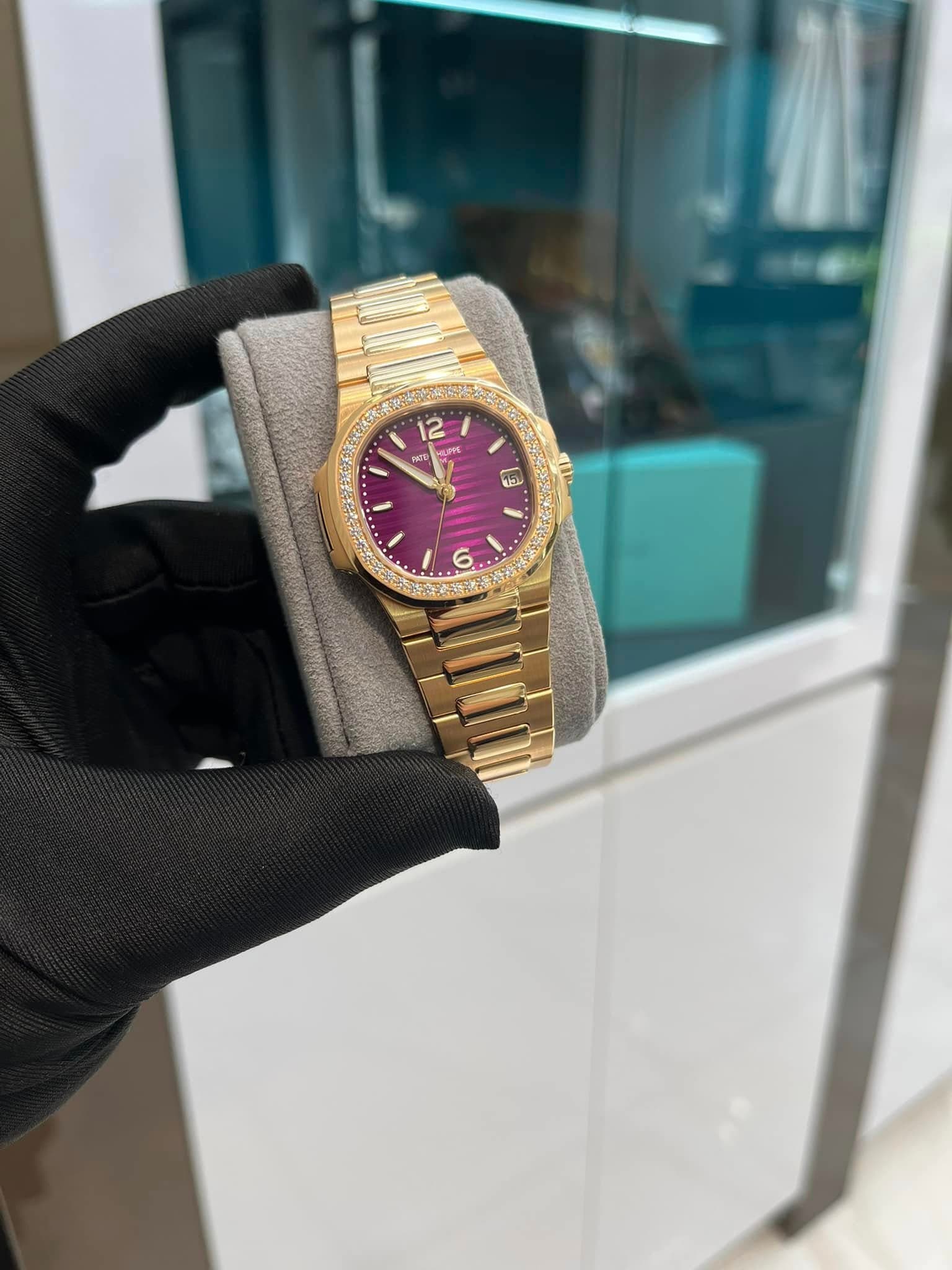 May be an image of wrist watch and text