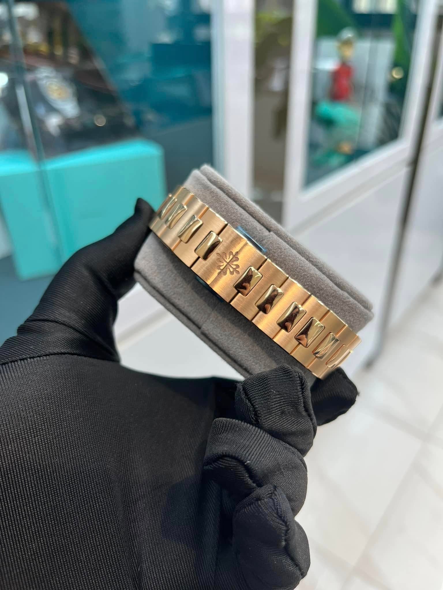 May be an image of jewelry and wrist watch