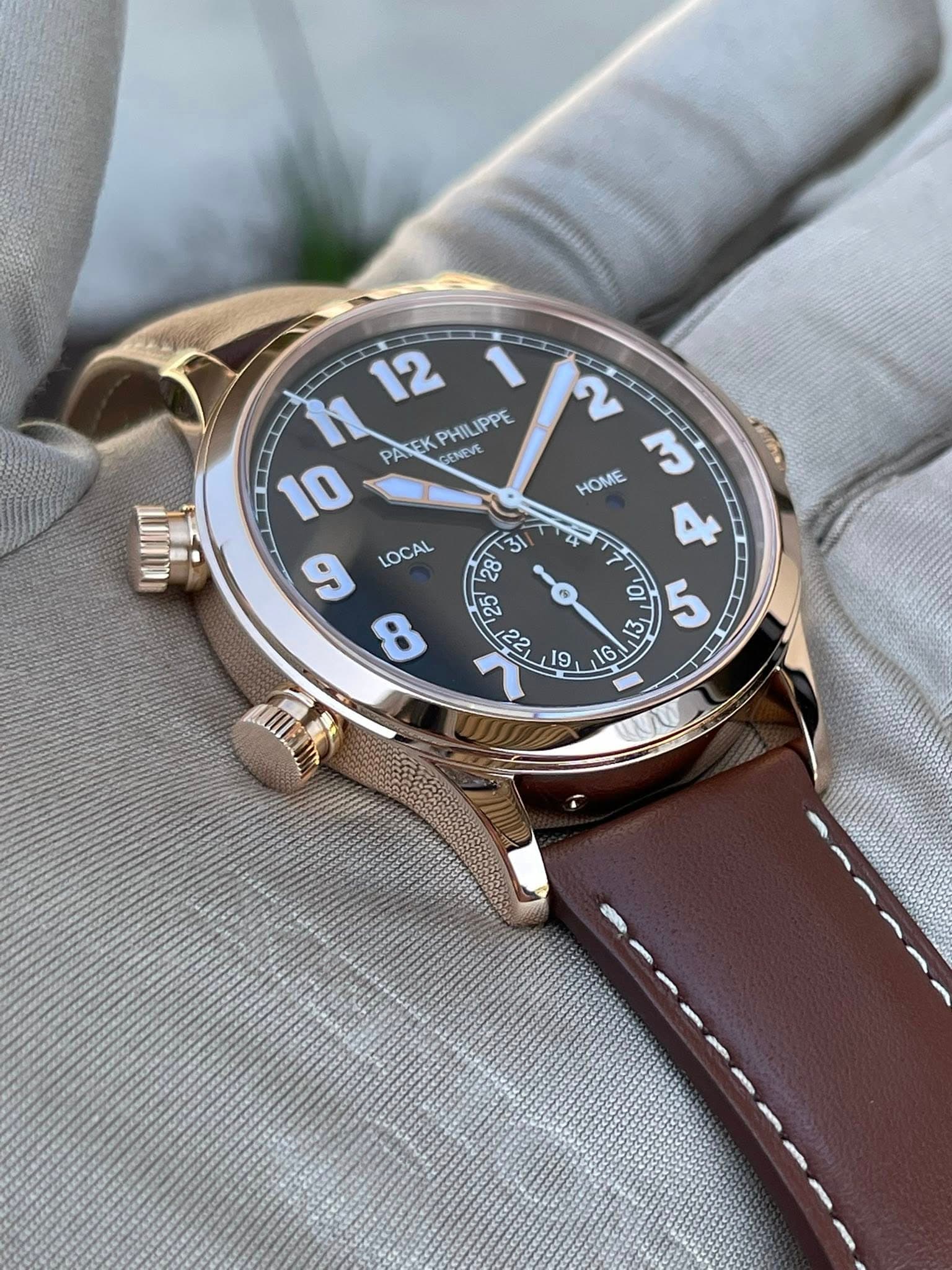 May be an image of wrist watch and text that says '12 PHIL IPPE 10 h PATEKPHILIPPE PA PATEK DENEVE 9 LOCAL B ល HOME M I0 ل '