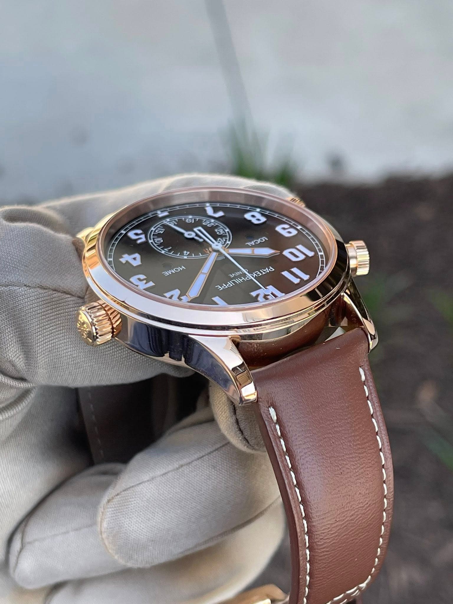 May be an image of wrist watch and text