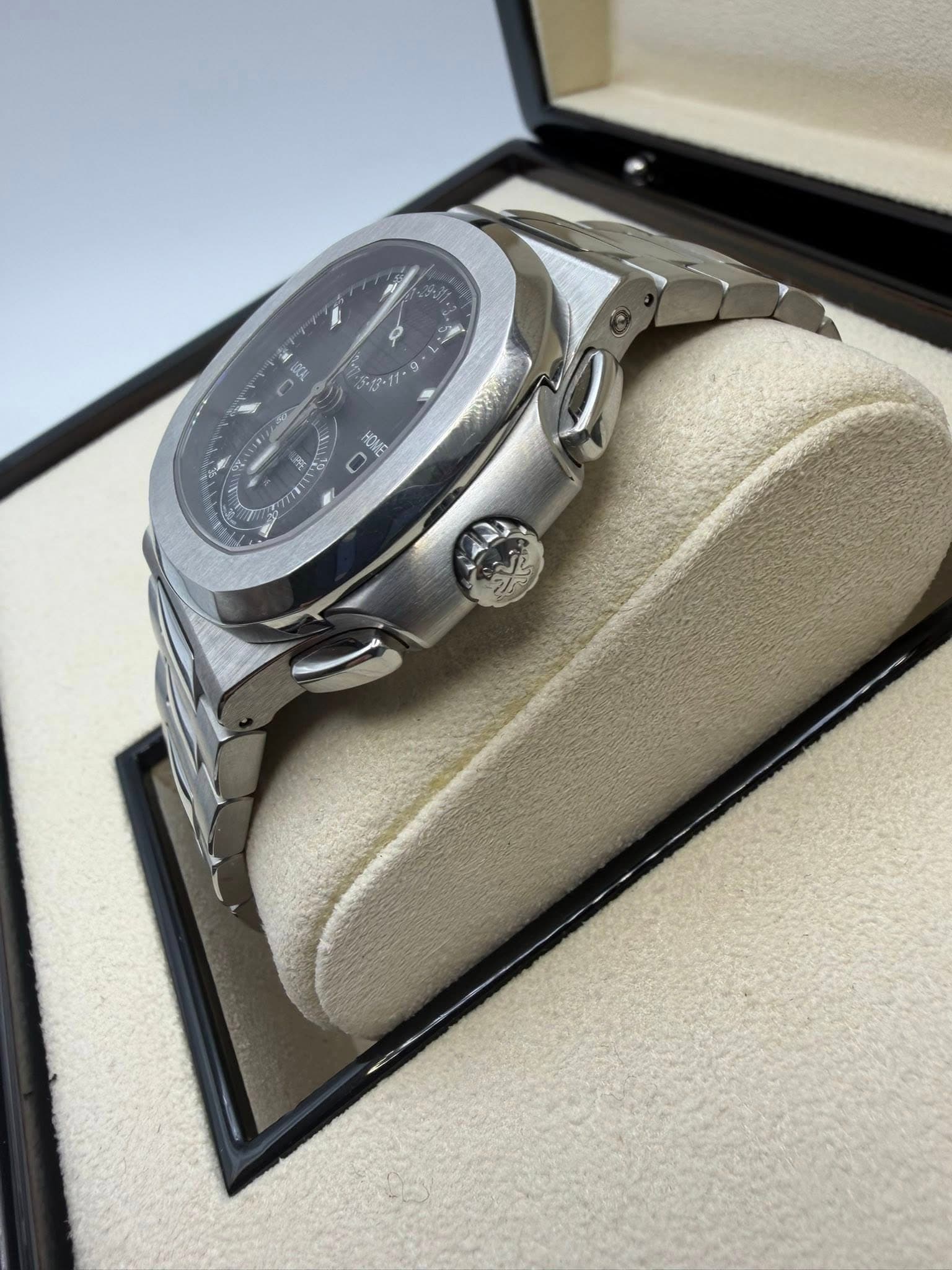 May be an image of wrist watch and text