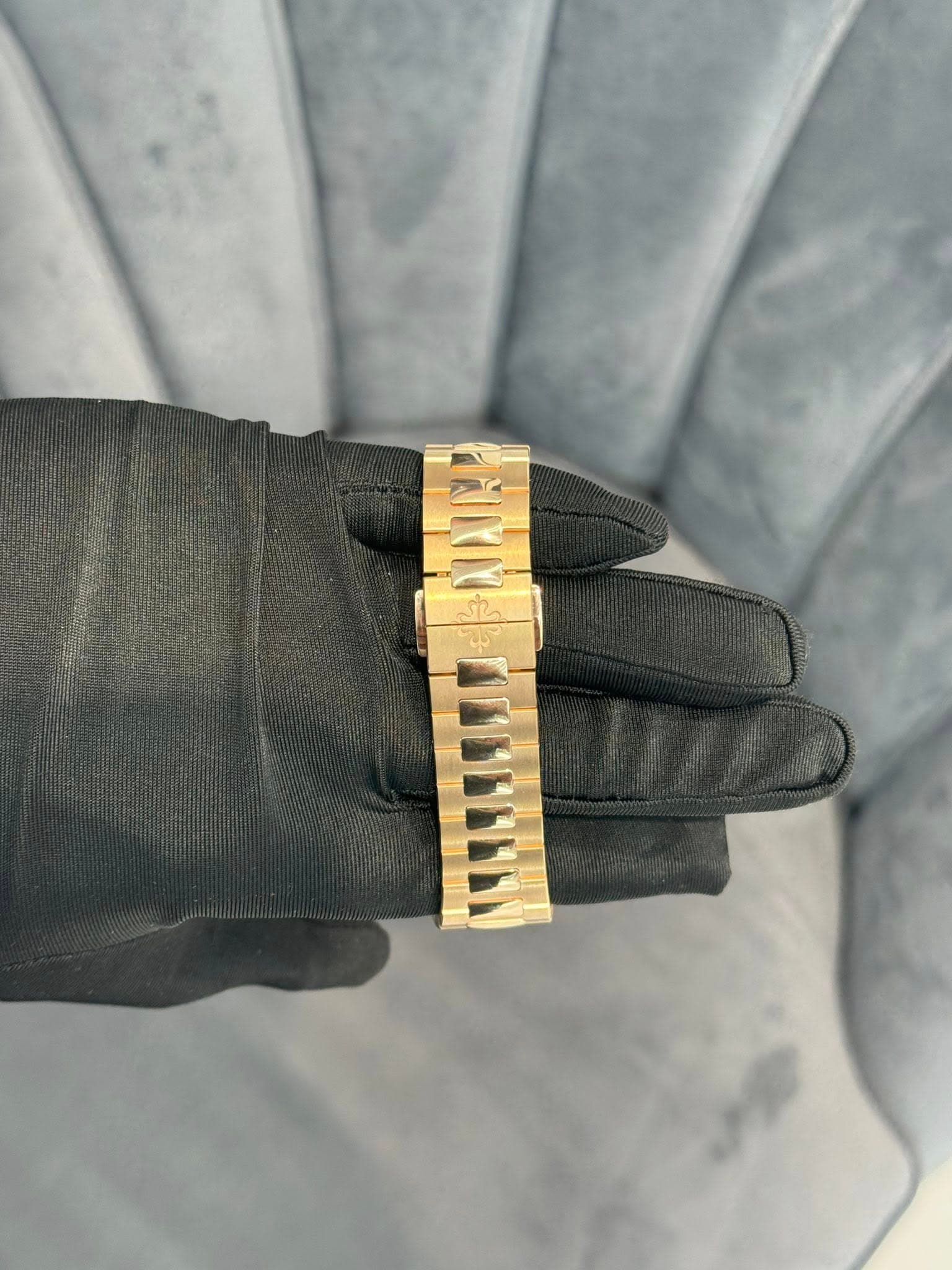 May be an image of wrist watch and jewelry