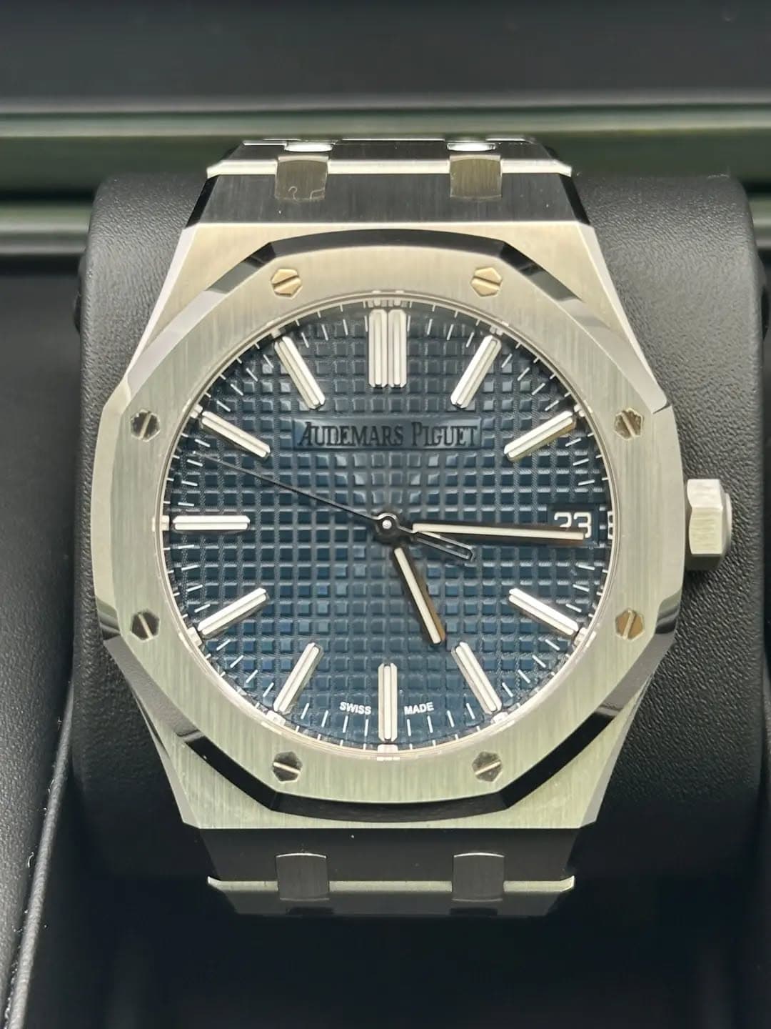 May be an image of wrist watch and text that says '33 Is SWISS ADE'