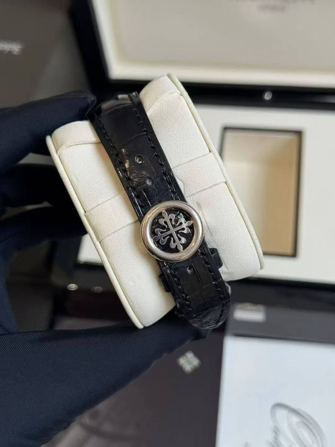 May be an image of wrist watch and text