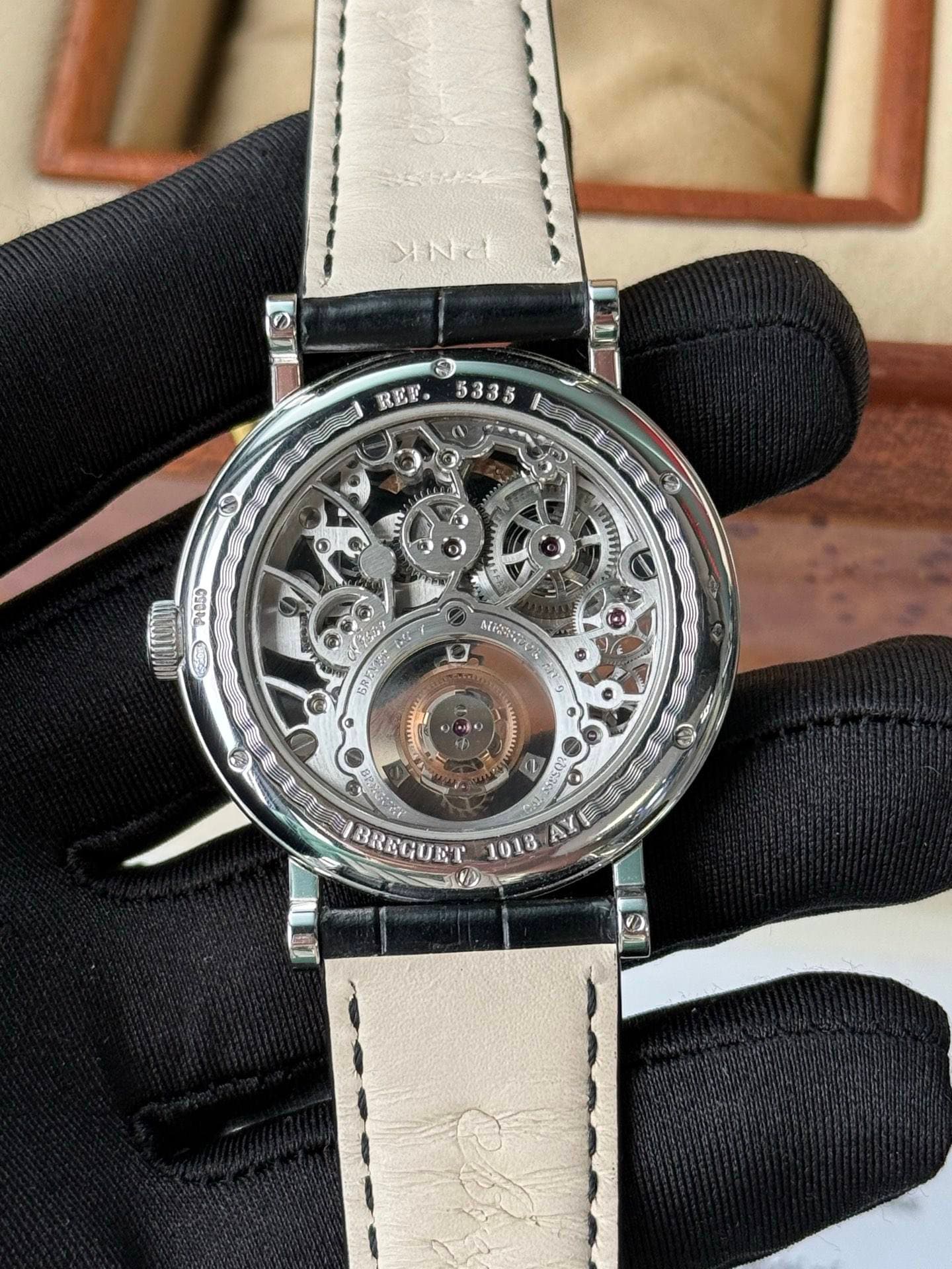 May be an image of wrist watch, pocketwatch and timer