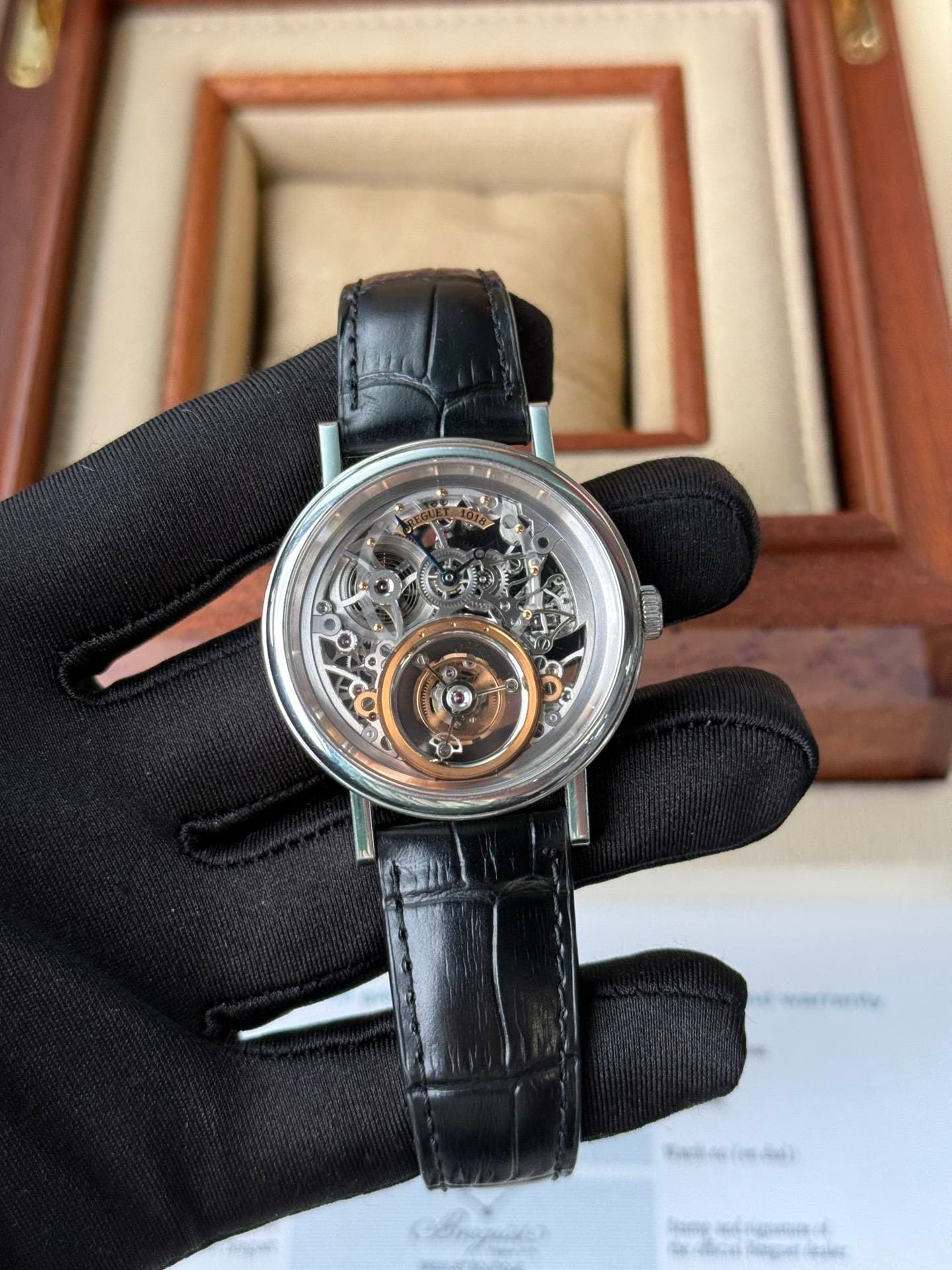 May be an image of wrist watch and text