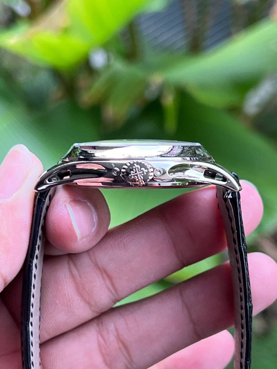 May be an image of eyewear and wrist watch
