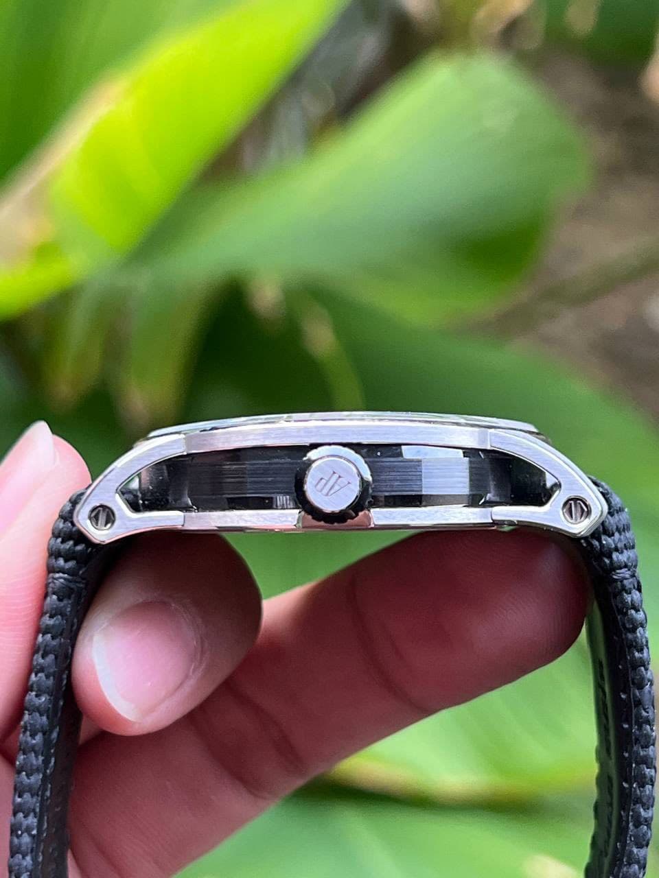 May be an image of lighter and digital watch