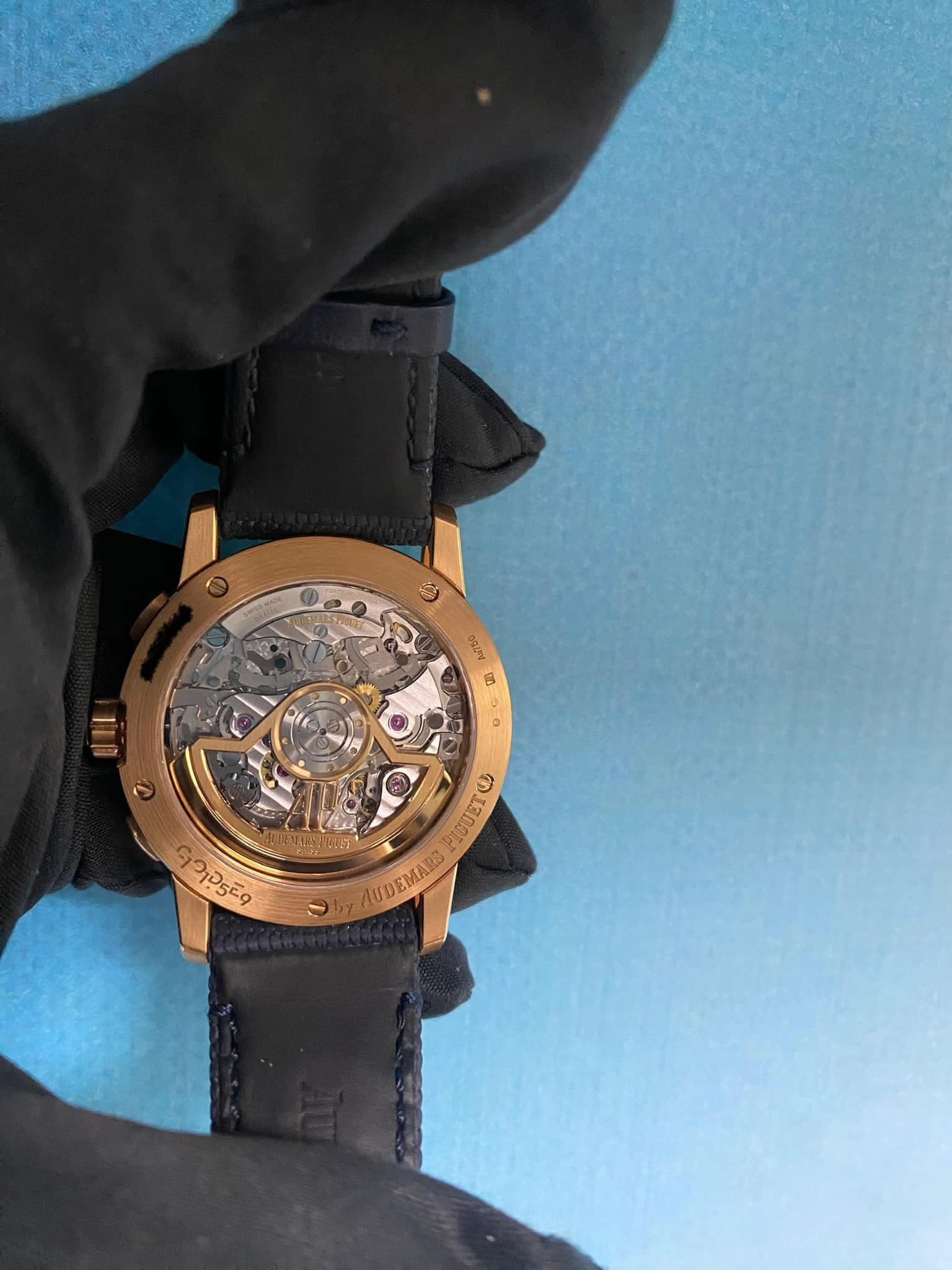 May be an image of wrist watch and text