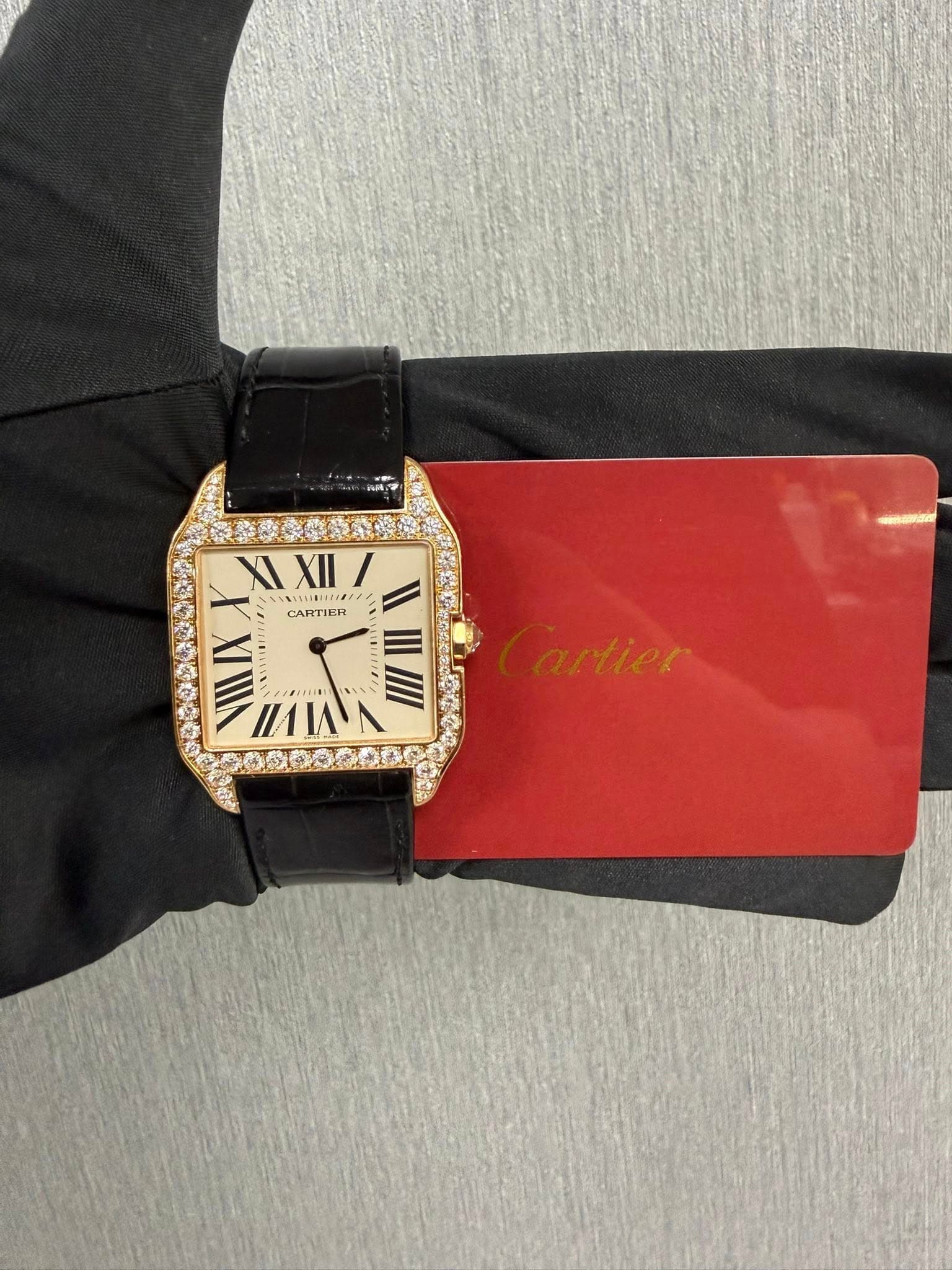 May be an image of wrist watch and text