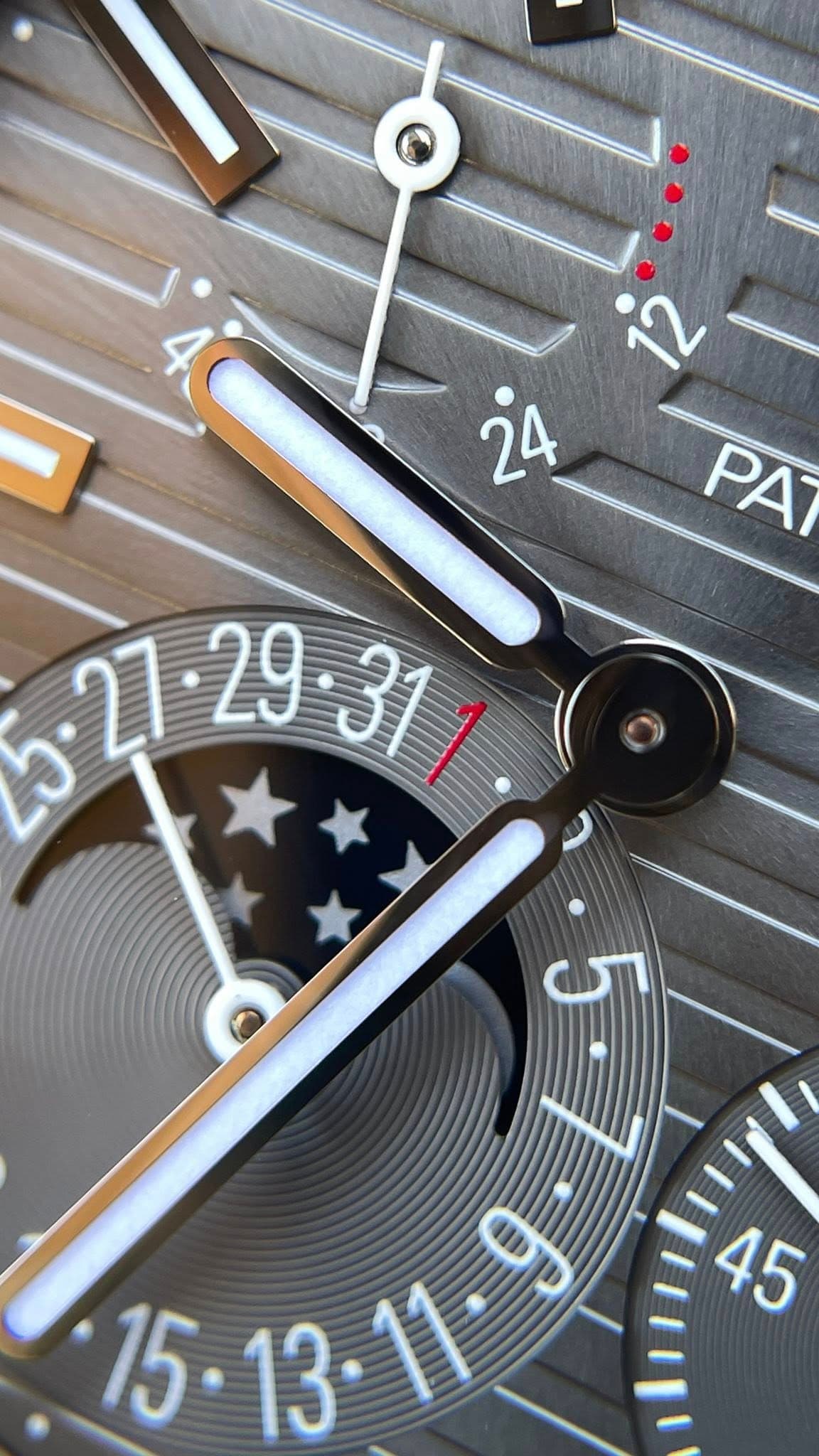 May be an image of wrist watch and text