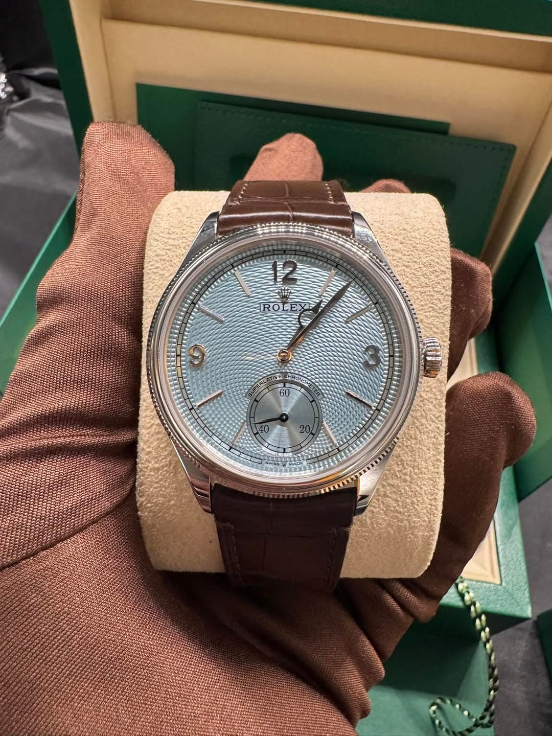 May be an image of wrist watch and text