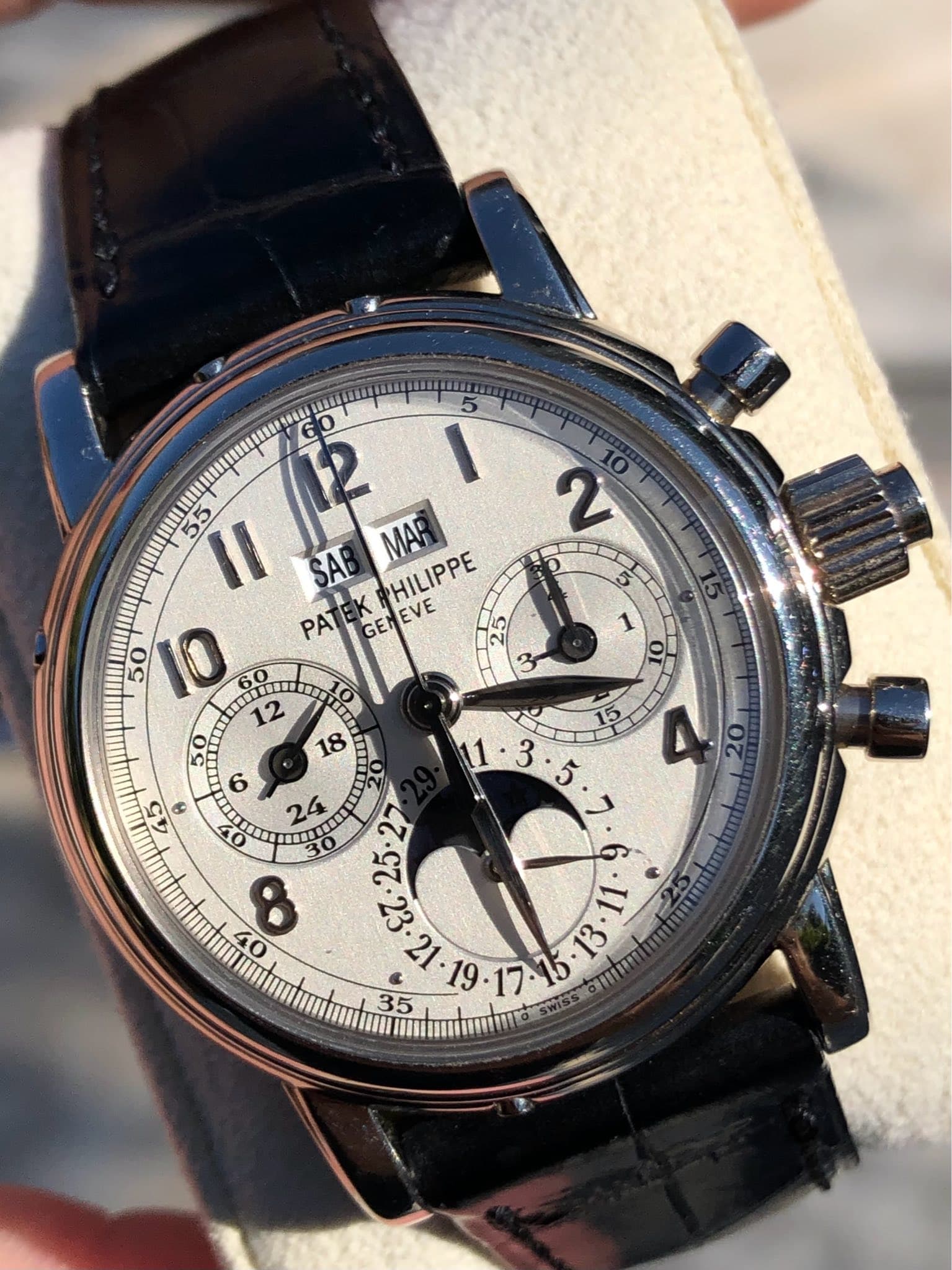 May be an image of wrist watch and text