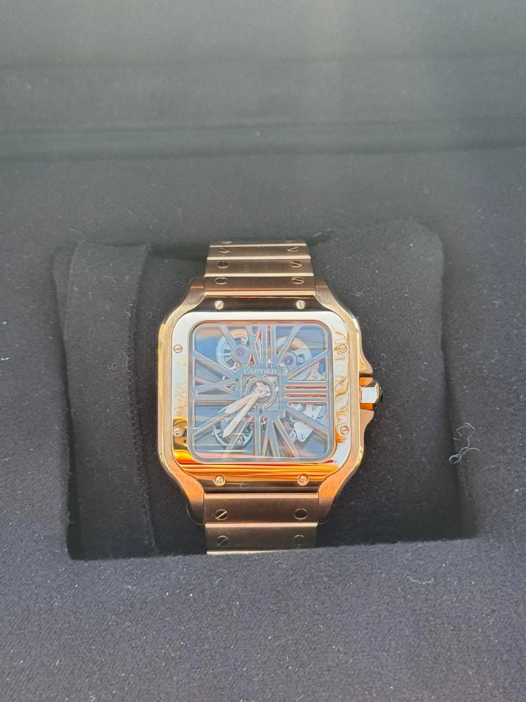 May be an image of wrist watch and text