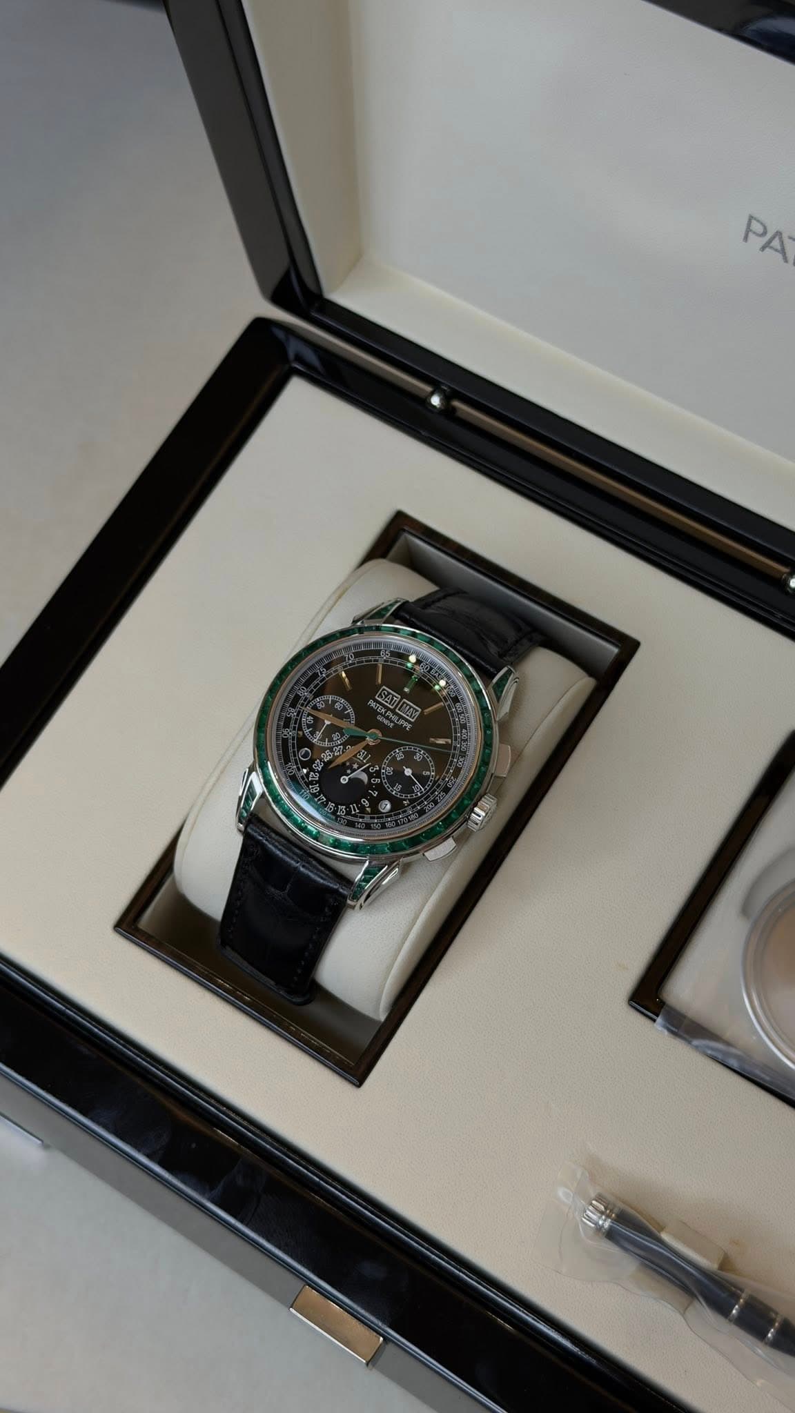 May be an image of wrist watch and text