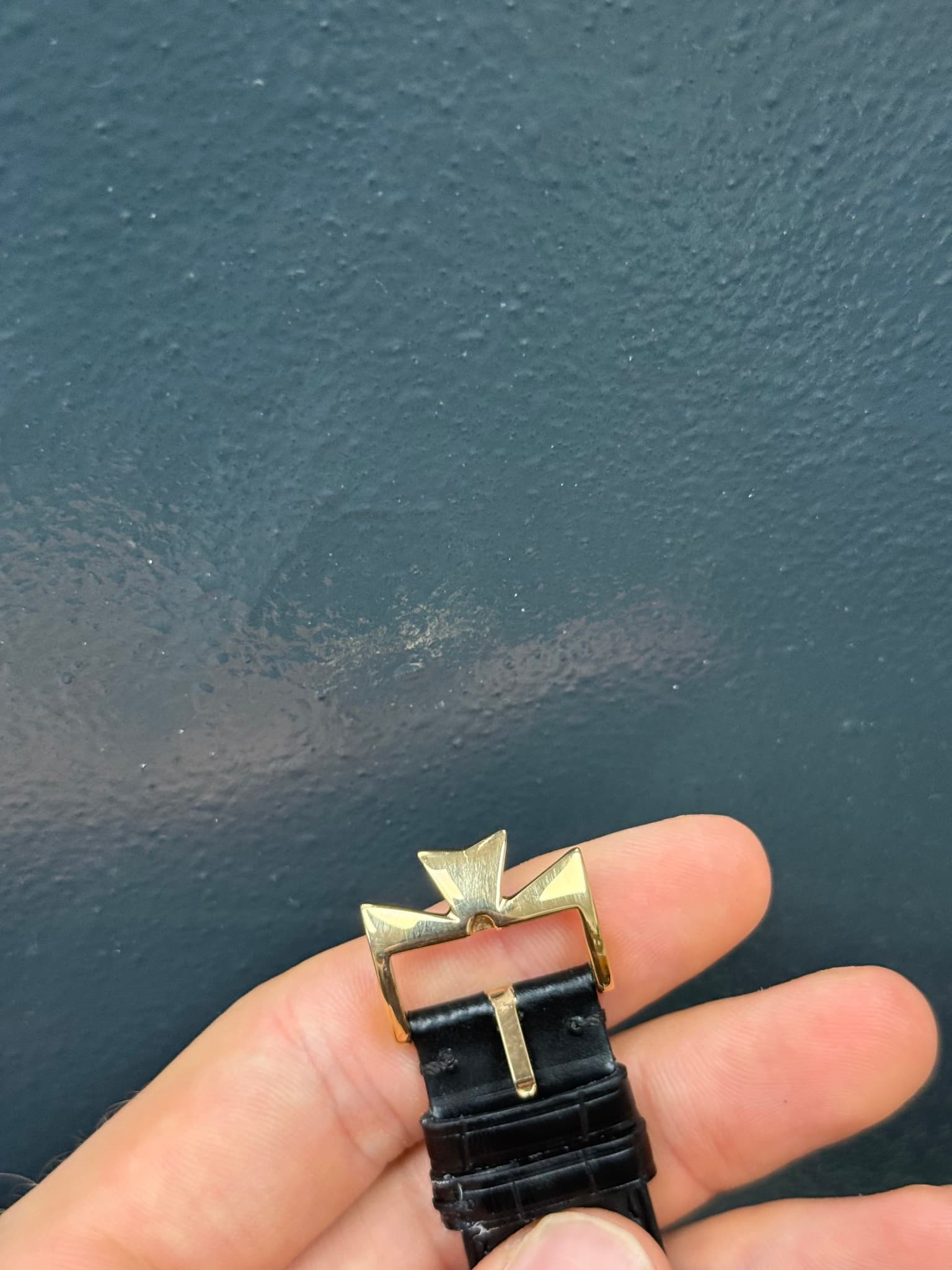 May be an image of brass and wrist watch