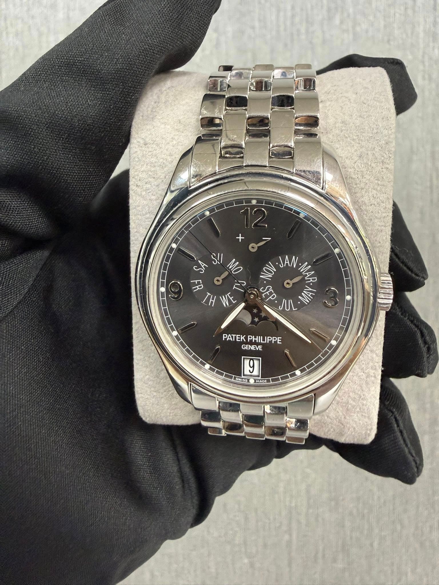 May be an image of wrist watch and text