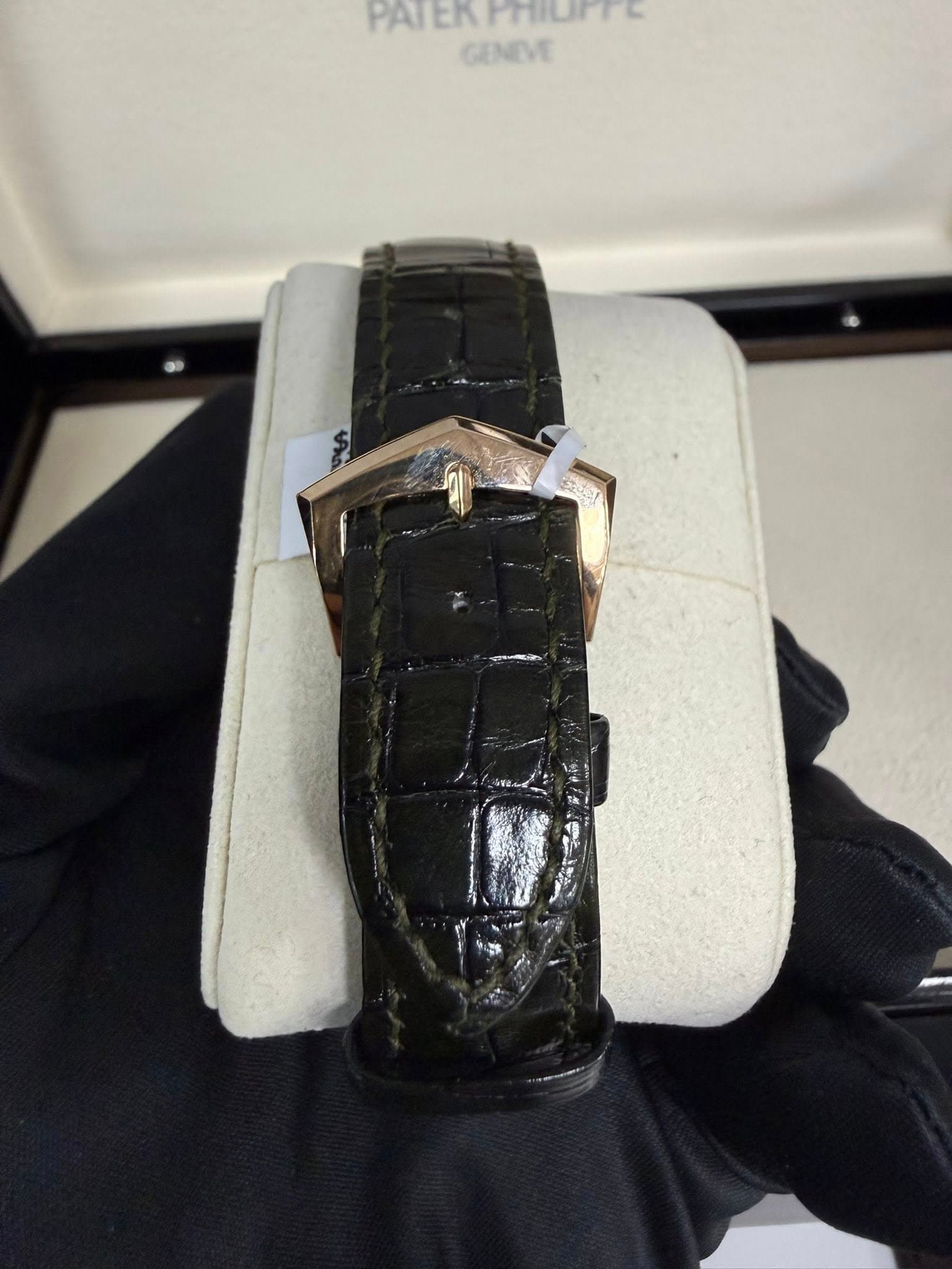 May be an image of wrist watch and text