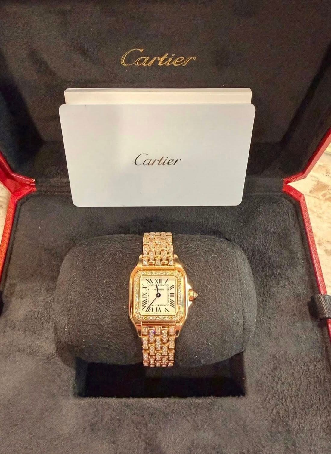 May be an image of wrist watch and text