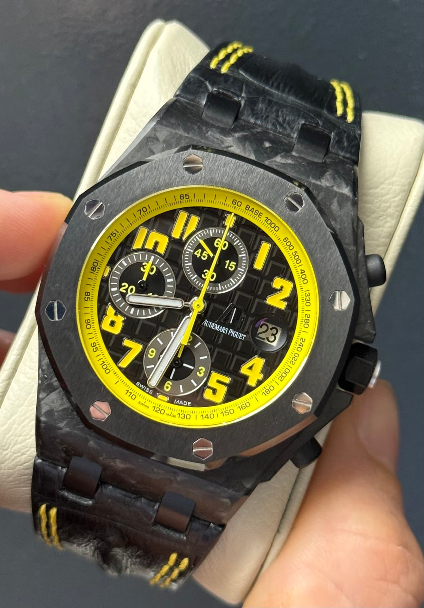 May be an image of wrist watch and text