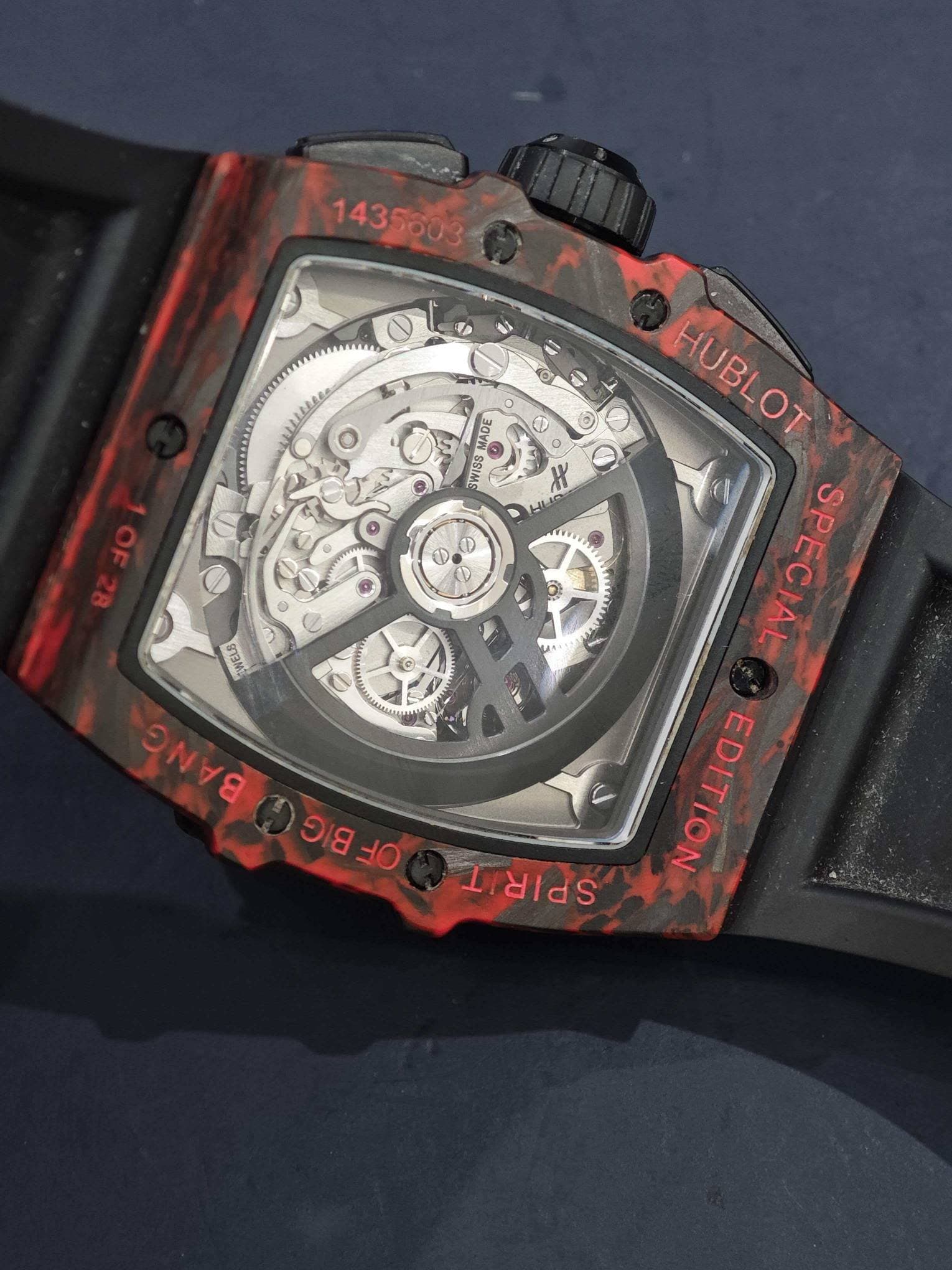 May be an image of wrist watch and text