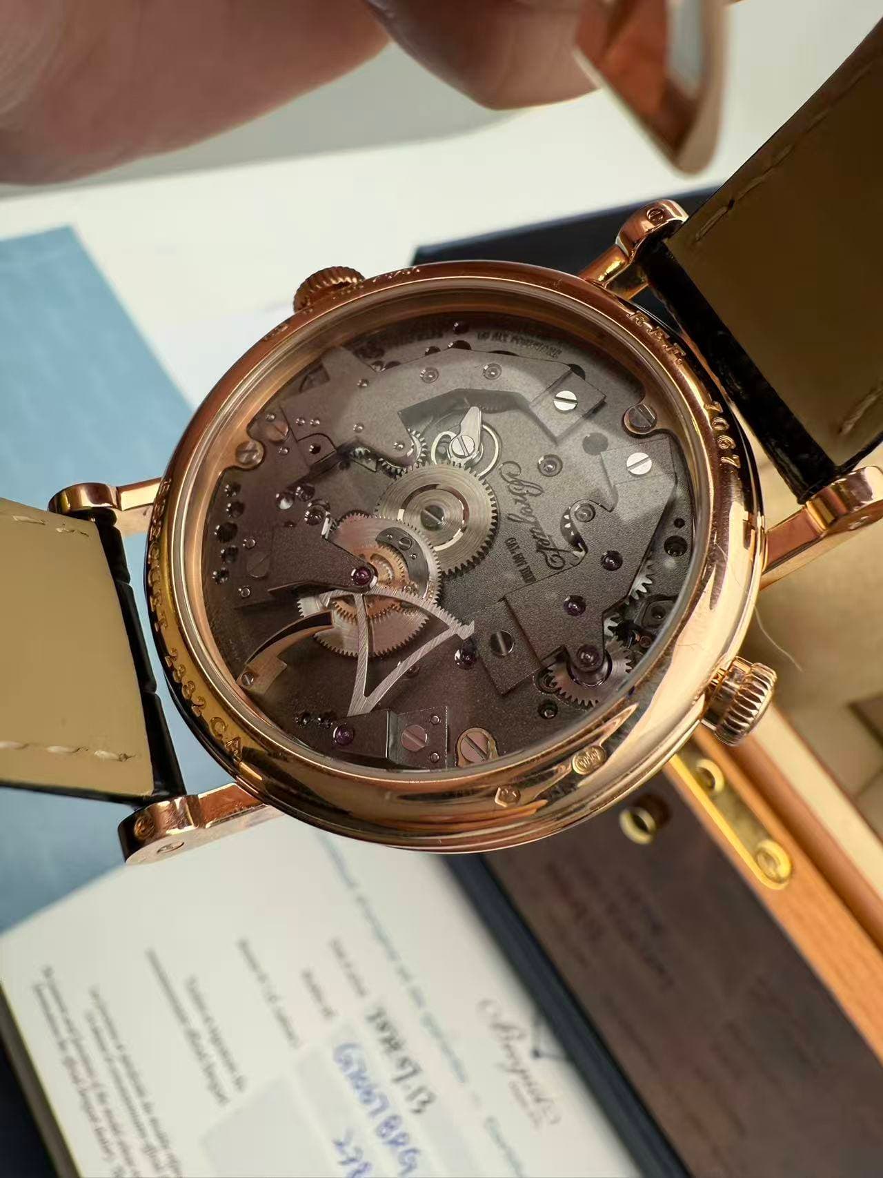 May be an image of wrist watch and text