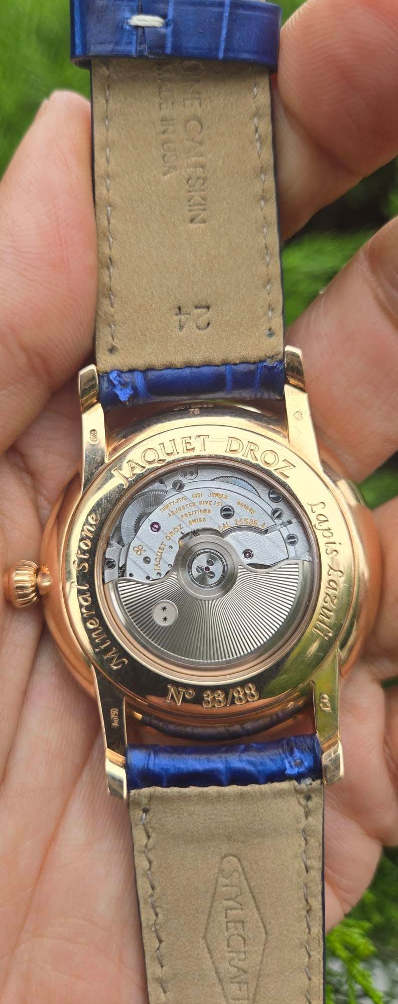 May be an image of wrist watch and text