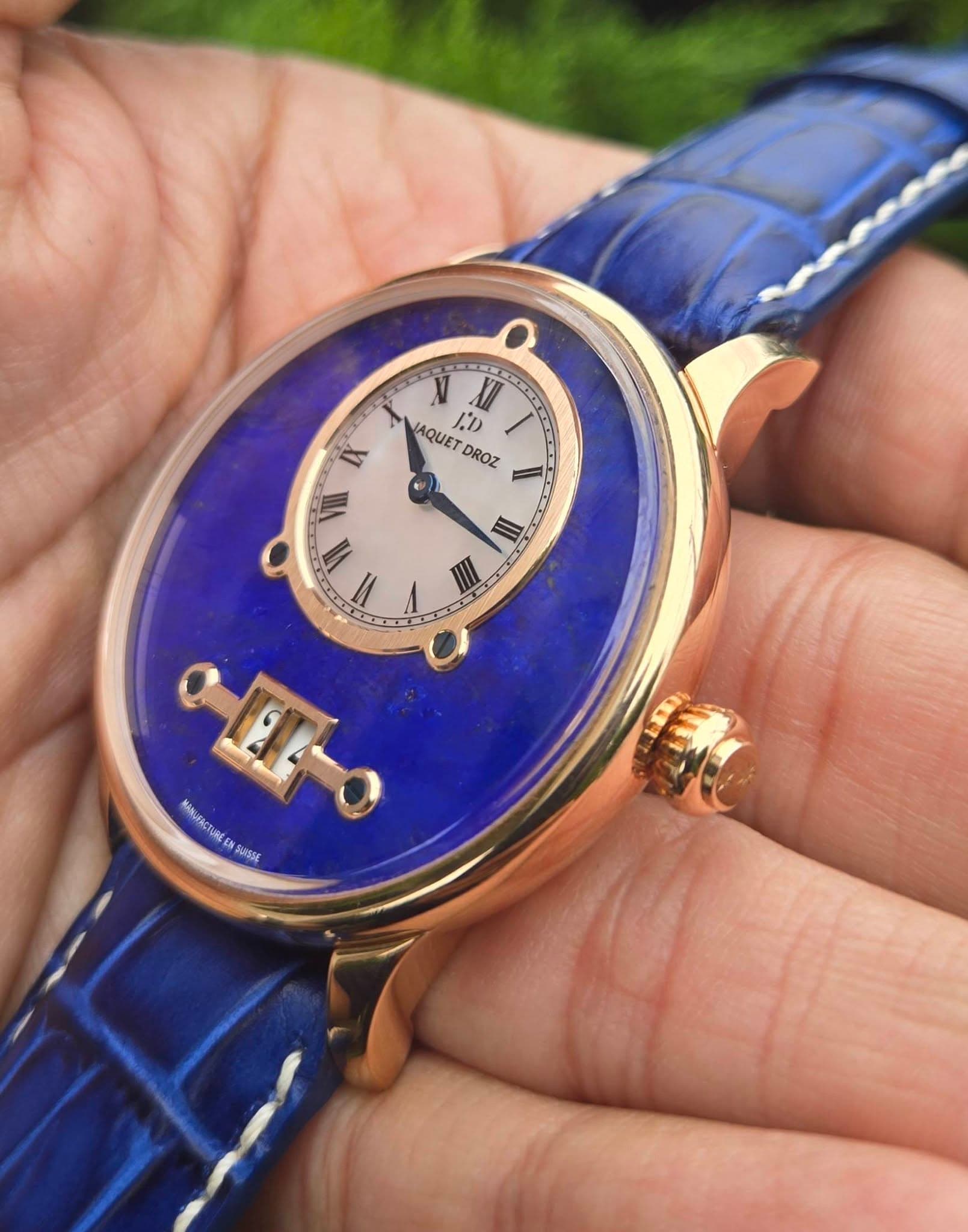 May be an image of wrist watch and text