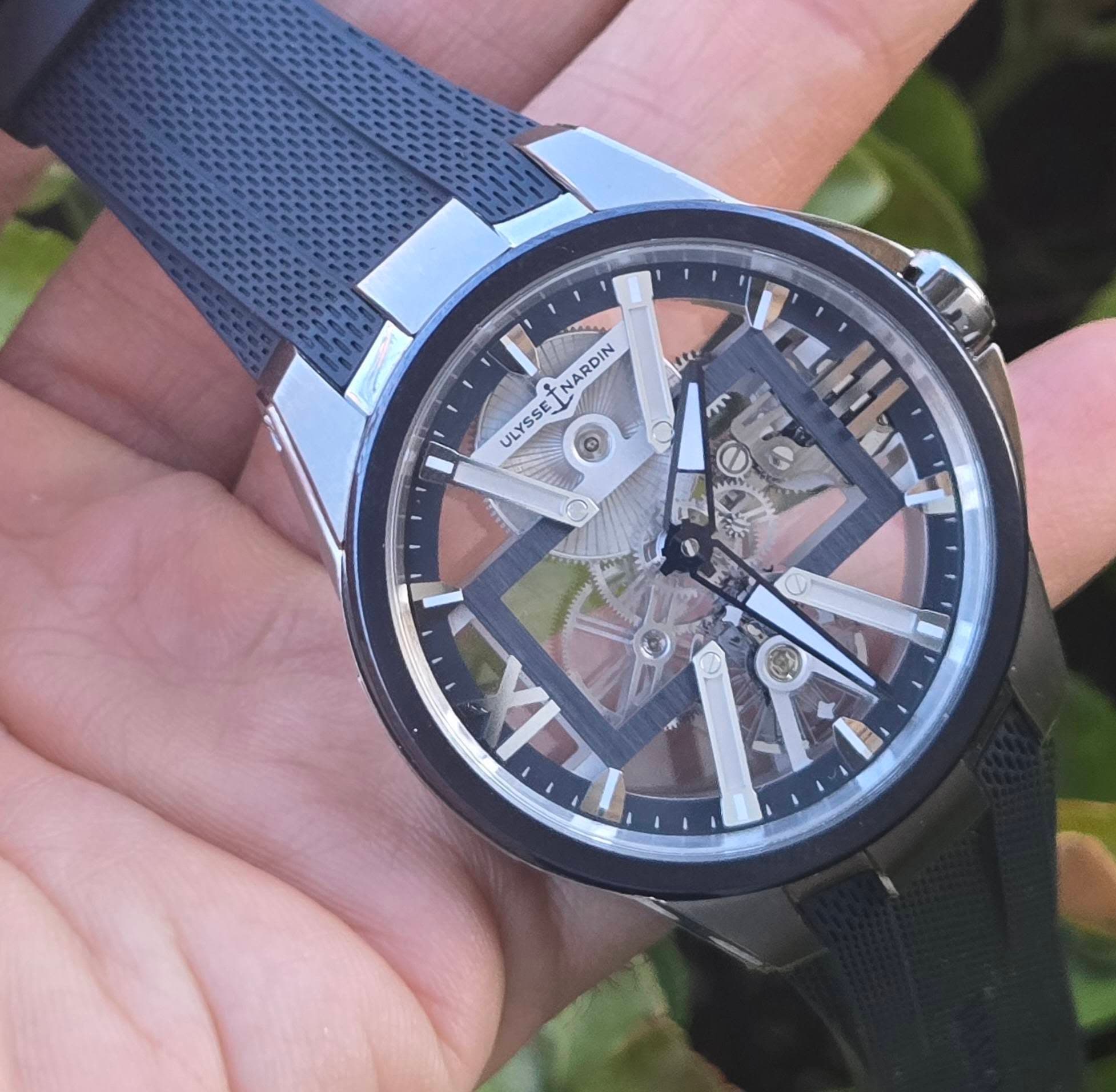 May be an image of wrist watch and text that says 'Lte سل L TNARDIN ULYSSE JLYSSETNARD ® y'