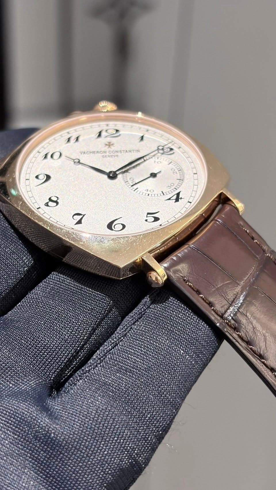 May be an image of wrist watch and text
