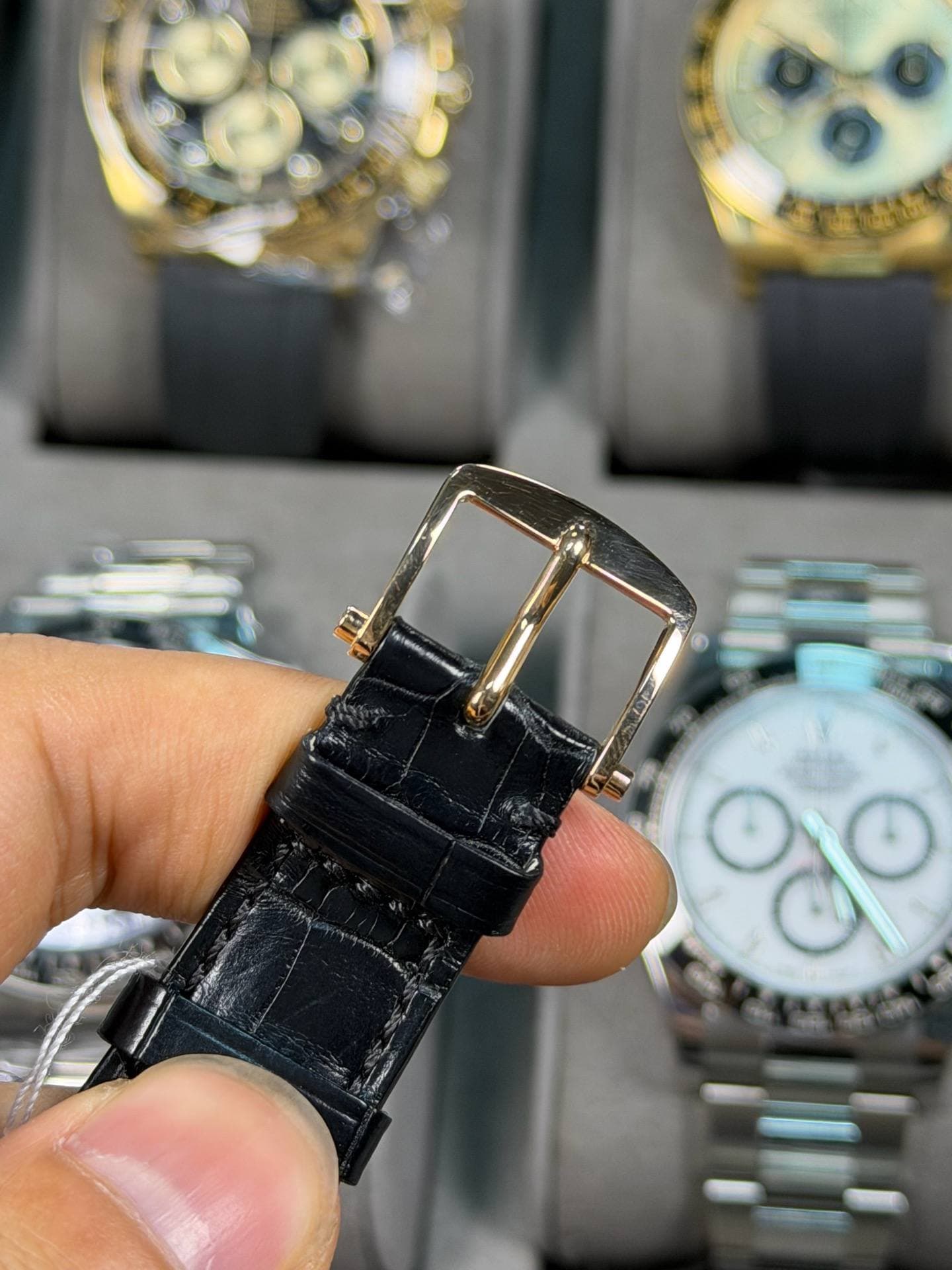 May be an image of wrist watch and text