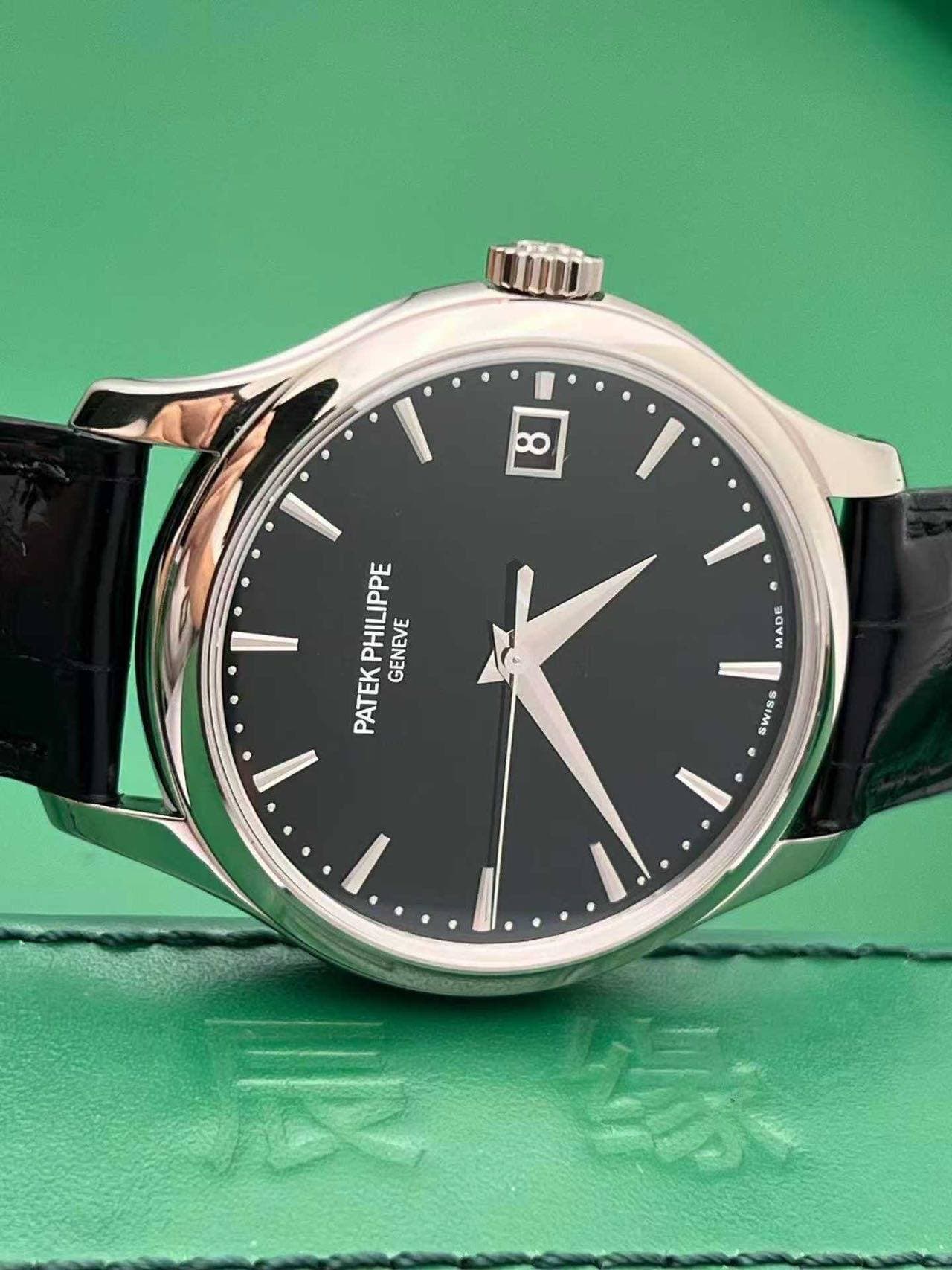May be an image of wrist watch and text that says 'い MADE PATEKPHILIPPE PHILIPPE GENEVE PATEK ۱٠ ز SWISS'