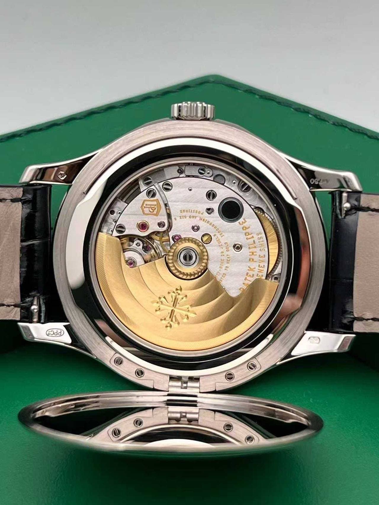 May be an image of wrist watch and text